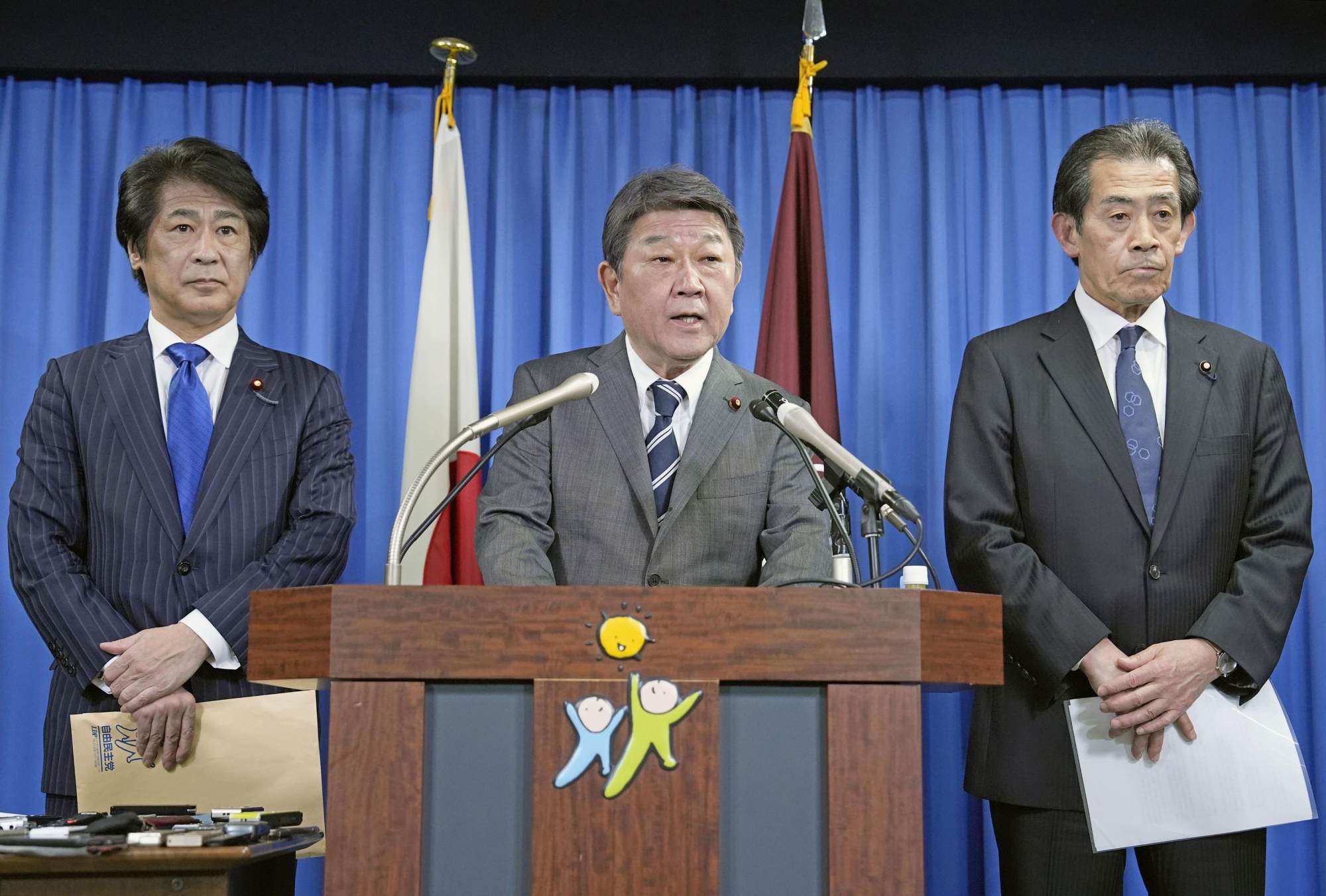 Toshimitsu Motegi (centre), secretary general of Japan’s ruling LDP, takes about the party’s political funds scandal last year. Photo: Kyodo Toshimitsu Motegi (centre), secretary general of Japan’s ruling LDP, takes about the party’s political funds scandal last year. Photo: Kyodo