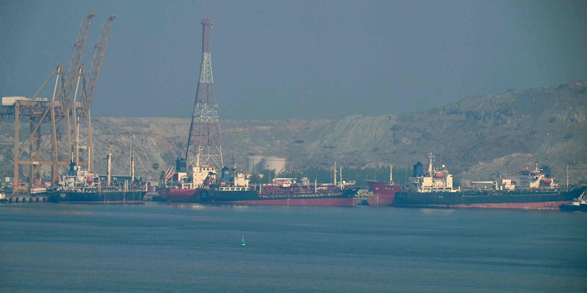 Tankers at the Khor Fakkan Container Terminal on Monday. It is the only natural deep-sea port in the Middle East and one of the major container ports in the Sharjah Emirate, along the Strait of Hormuz, a waterway through which one-fifth of global oil output passes. Photo: AFP Tankers at the Khor Fakkan Container Terminal on Monday. It is the only natural deep-sea port in the Middle East and one of the major container ports in the Sharjah Emirate, along the Strait of Hormuz, a waterway through which one-fifth of global oil output passes. Photo: AFP
