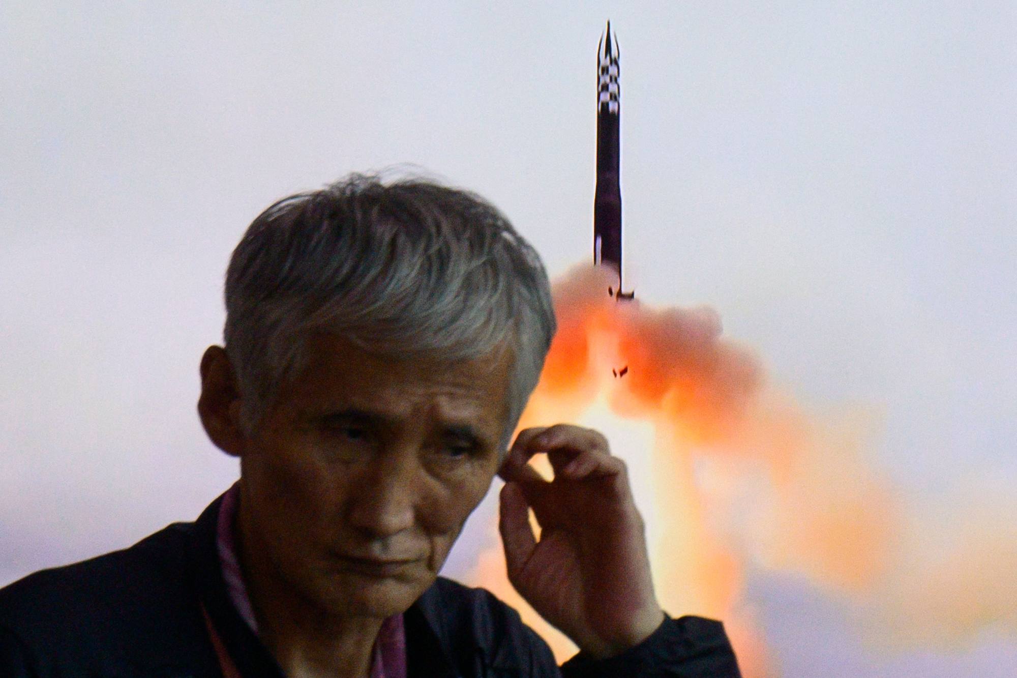 A man walks past a television screen showing a news broadcast with footage of a North Korean missile test at a railway station in Seoul on September 18, 2024. Photo: AFP A man walks past a television screen showing a news broadcast with footage of a North Korean missile test at a railway station in Seoul on September 18, 2024. Photo: AFP