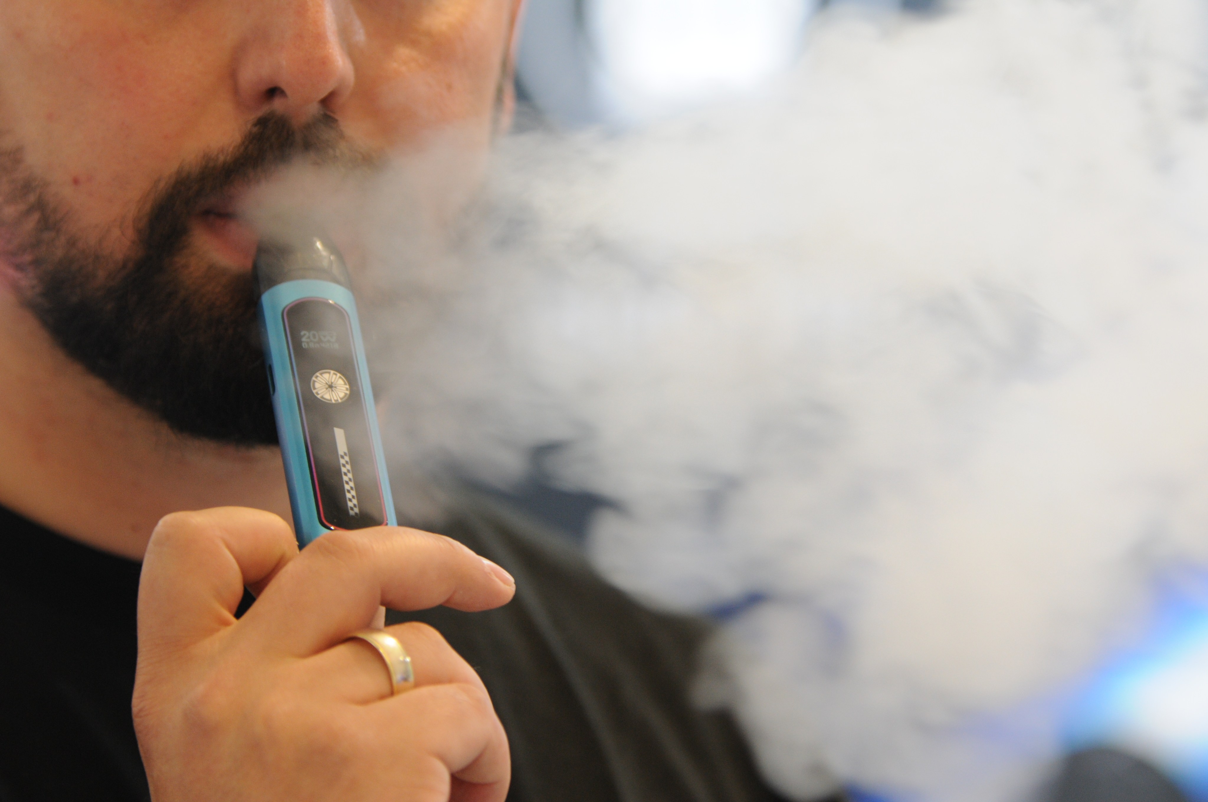A man smoking an e-cigarette. Vaping is fast catching on in Malaysia. Photo: dpa