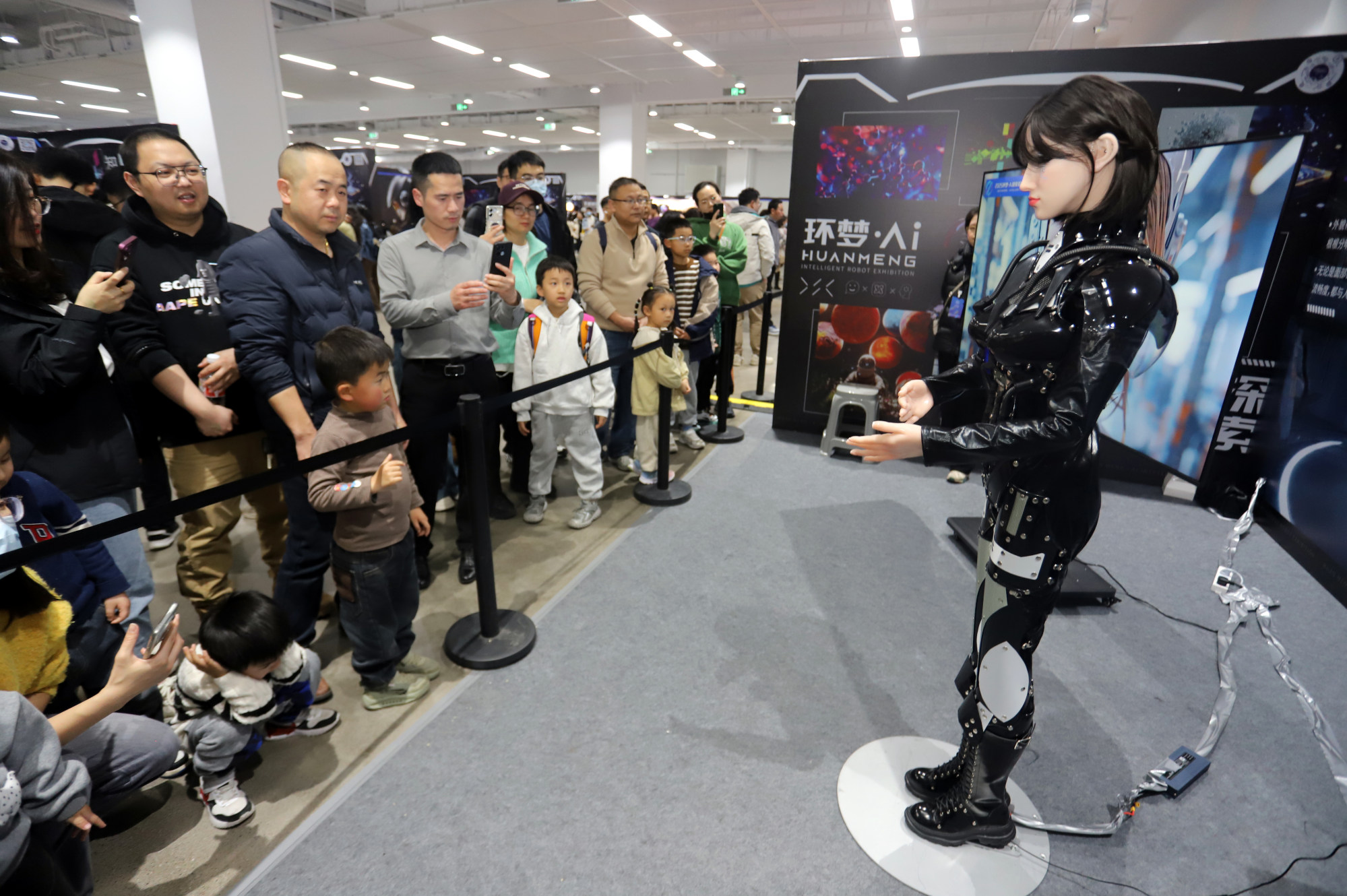Visitors attend the 2025 Huanmeng AI Intelligent Robot science exhibition in Suzhou, China, on March 1, 2025. Photo: NurPhoto via Getty Images Visitors attend the 2025 Huanmeng AI Intelligent Robot science exhibition in Suzhou, China, on March 1, 2025. Photo: NurPhoto via Getty Images