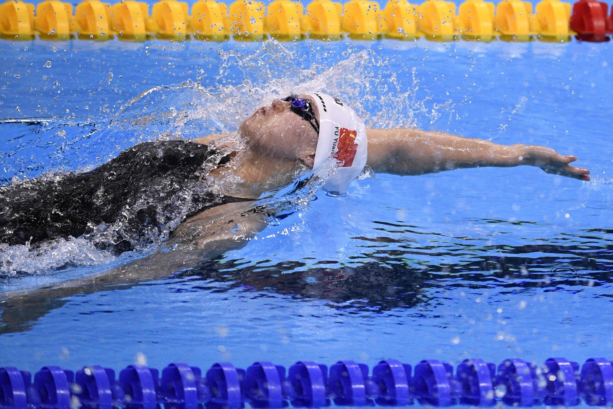 Fu competed in the Women’s 100m backstroke final during the swimming event at the Rio 2016 Olympic Games at the Olympic Aquatics Stadium in Rio de Janeiro on August 8, 2016. Photo: AFP/Martin Bureau Fu competed in the Women’s 100m backstroke final during the swimming event at the Rio 2016 Olympic Games at the Olympic Aquatics Stadium in Rio de Janeiro on August 8, 2016. Photo: AFP/Martin Bureau