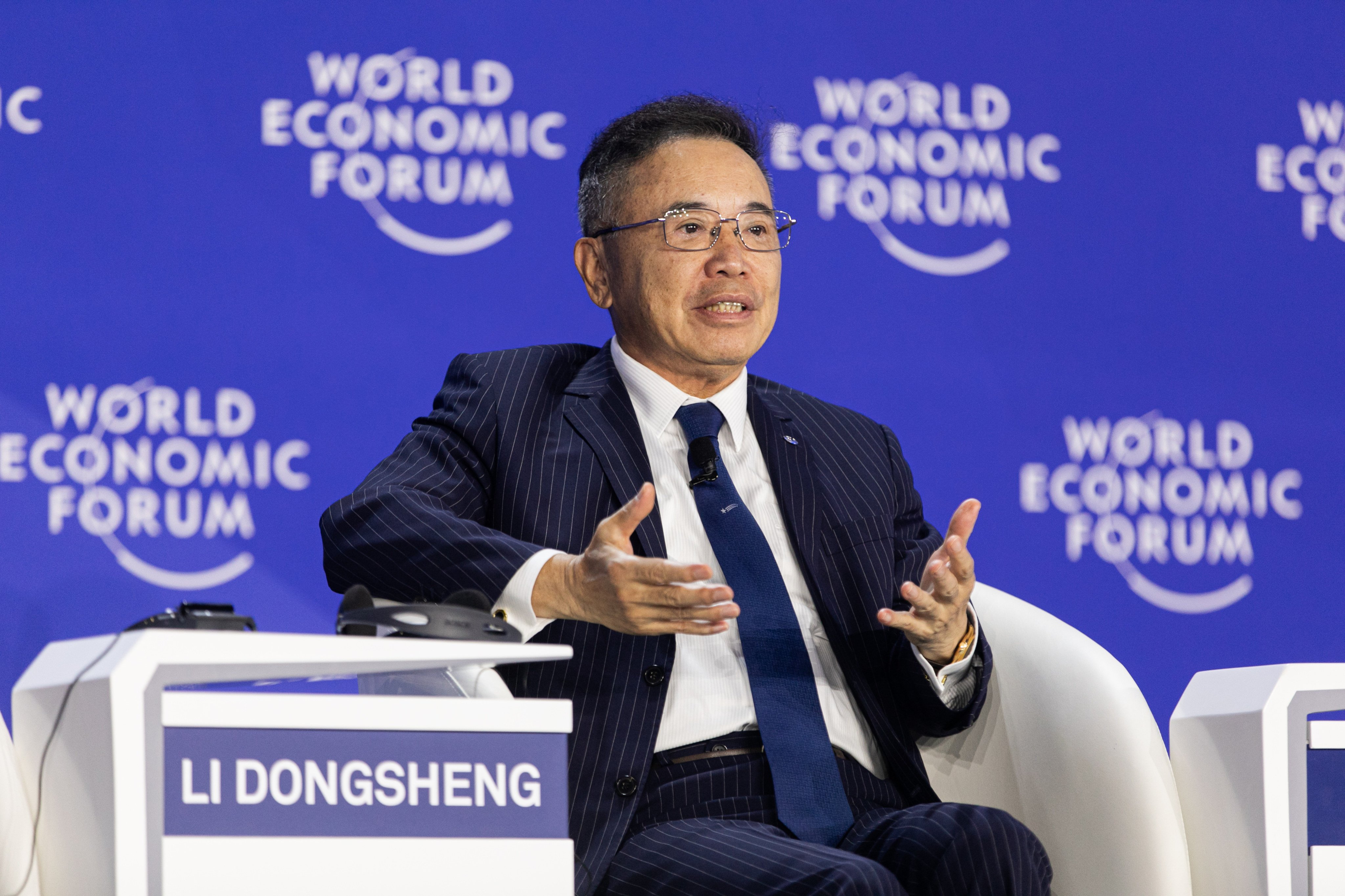 Li Dongsheng, founder and chairman of TCL, speaks at a World Economic Forum panel in Tianjin. Photo: Handout
