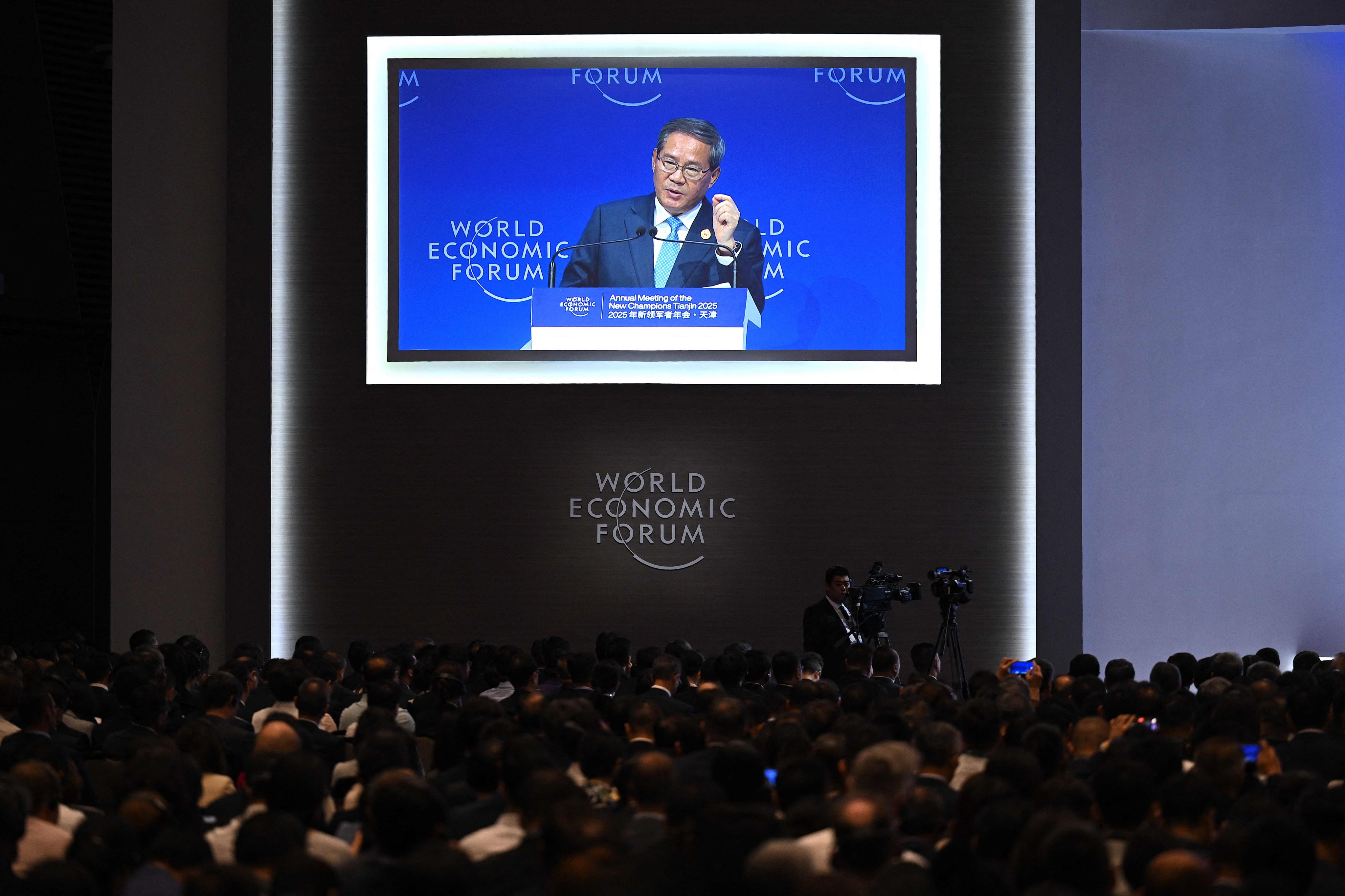 Chinese Premier Li Qiang speaks at Summer Davos. Photo: AFP