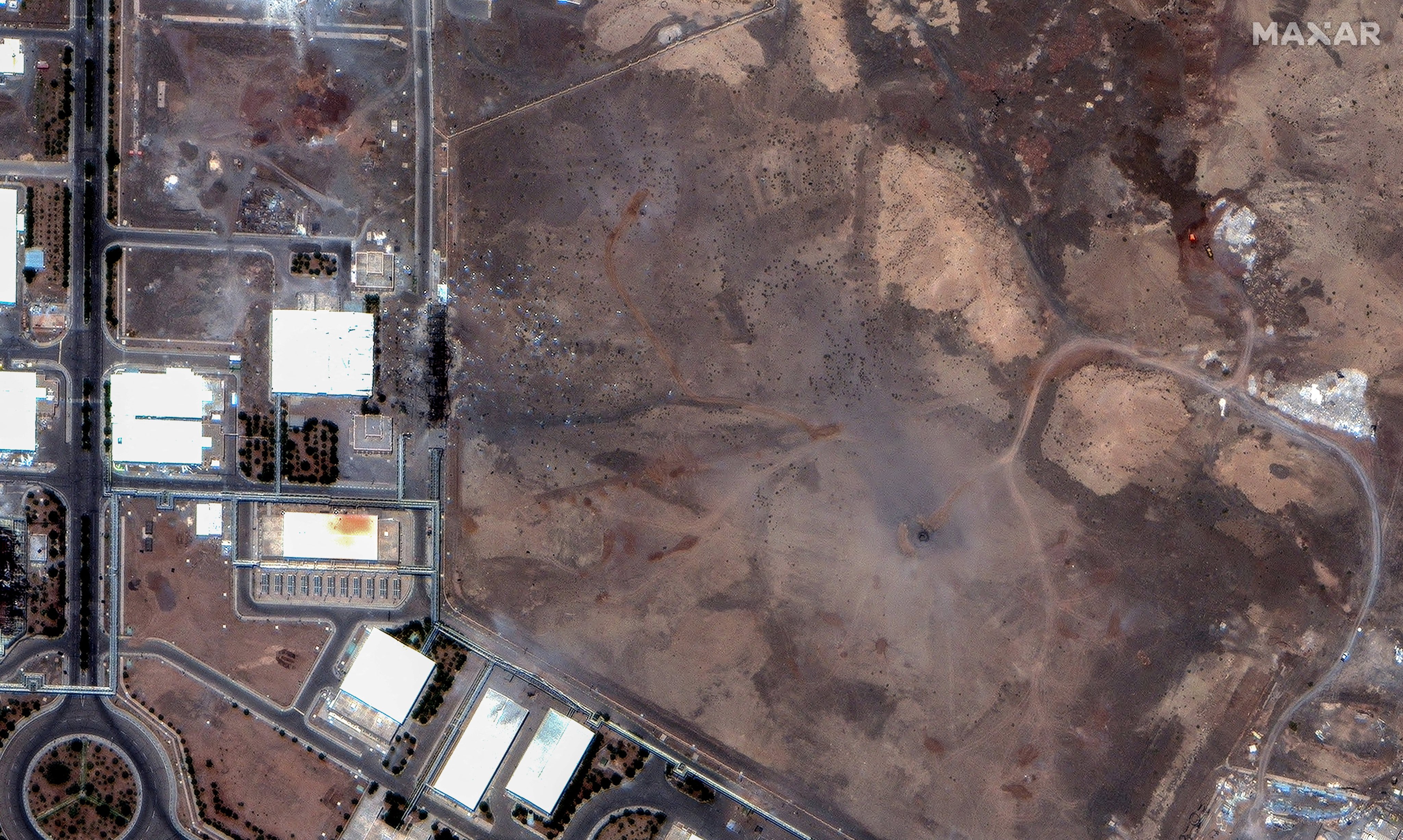 A satellite image shows air strike craters over the underground centrifuge halls of the Natanz enrichment facility in Iran following US strikes on Sunday. Photo: Maxar Technologies/Handout via Reuters