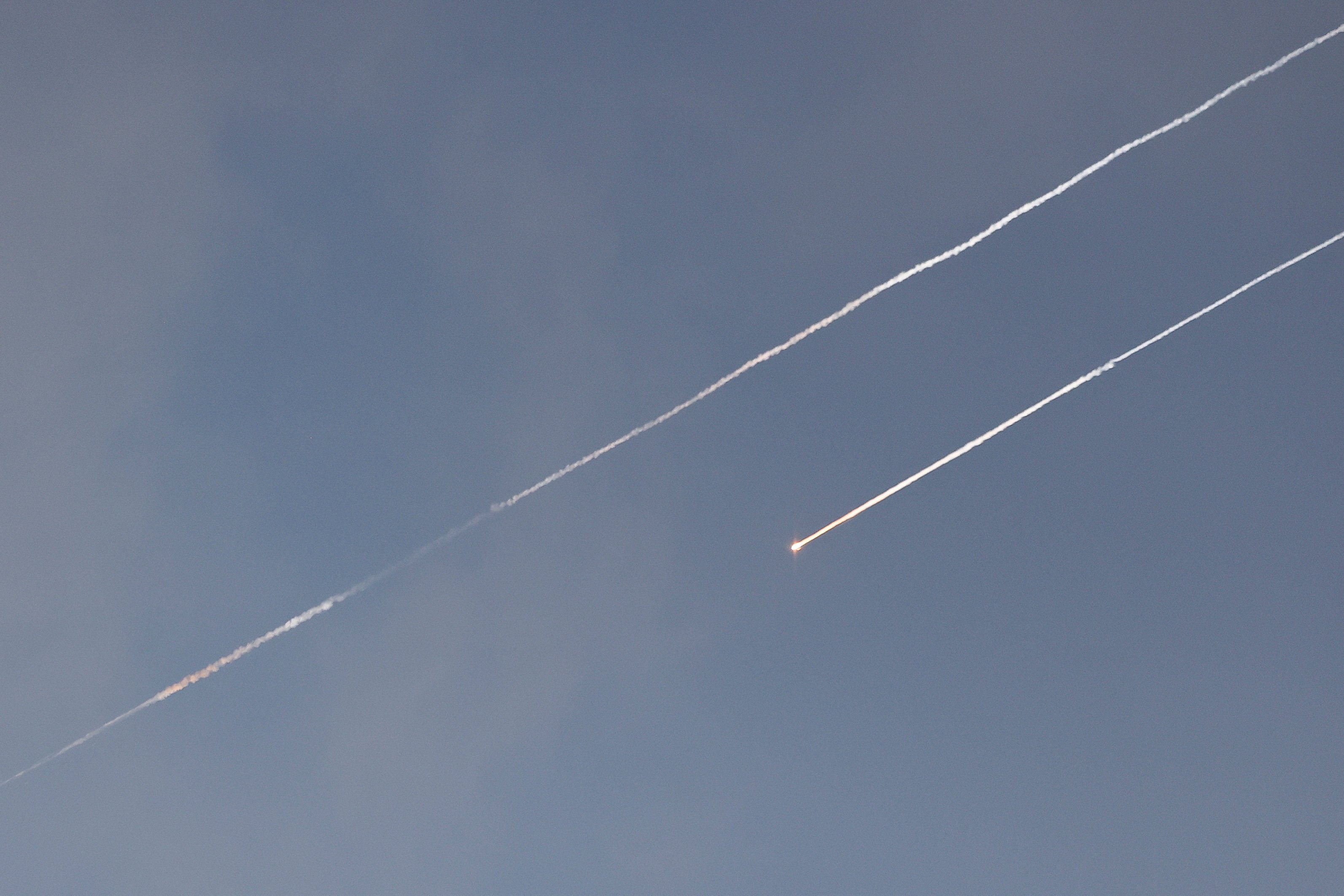 Missiles launched from Iran are seen over Jerusalem amid the Iran-Israel conflict on Tuesday. Photo: Reuters