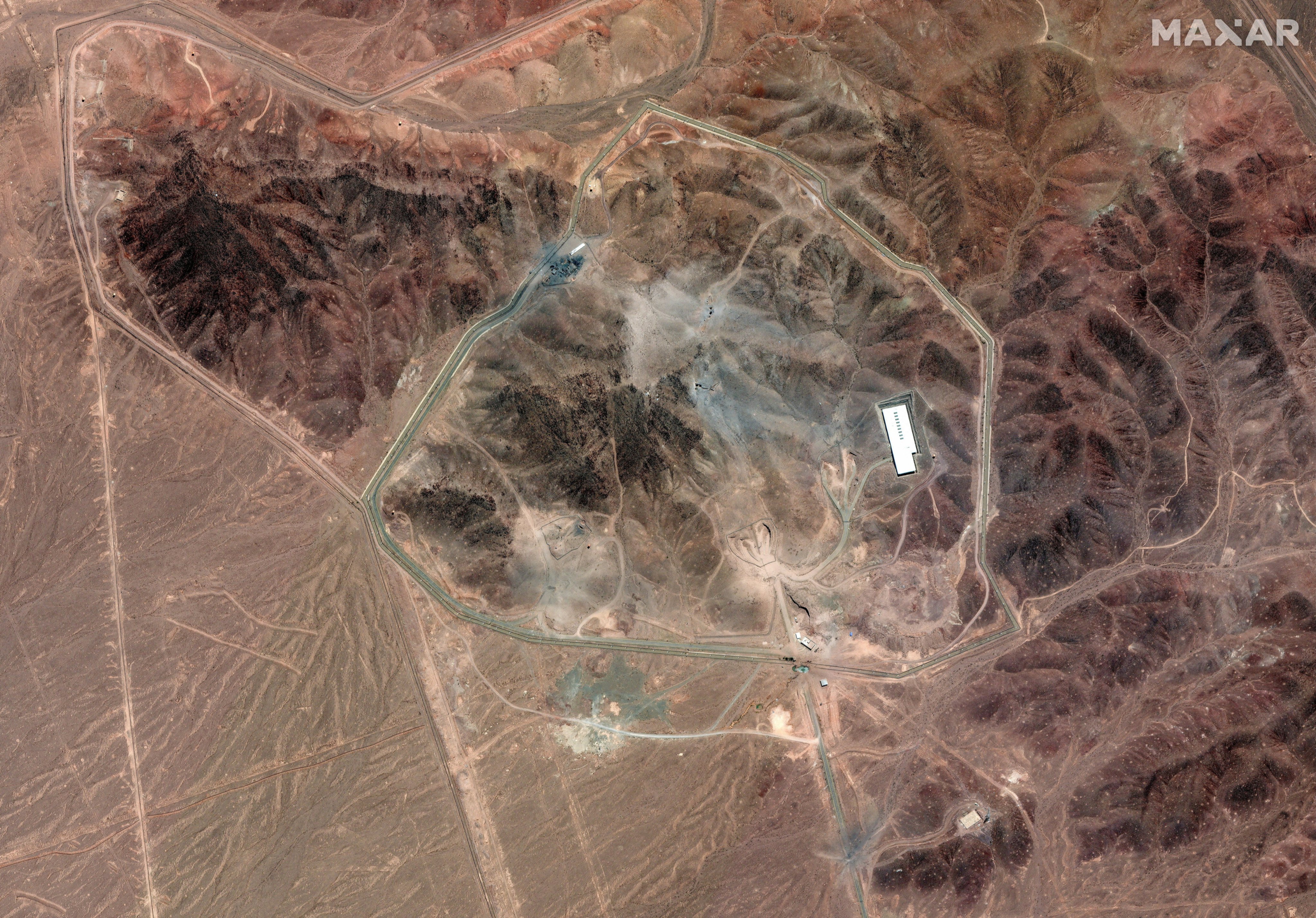A satellite overview shows the damaged Fordow Fuel Enrichment Facility near Qom, Iran, on Tuesday. Image: Maxar Technologies via Reuters