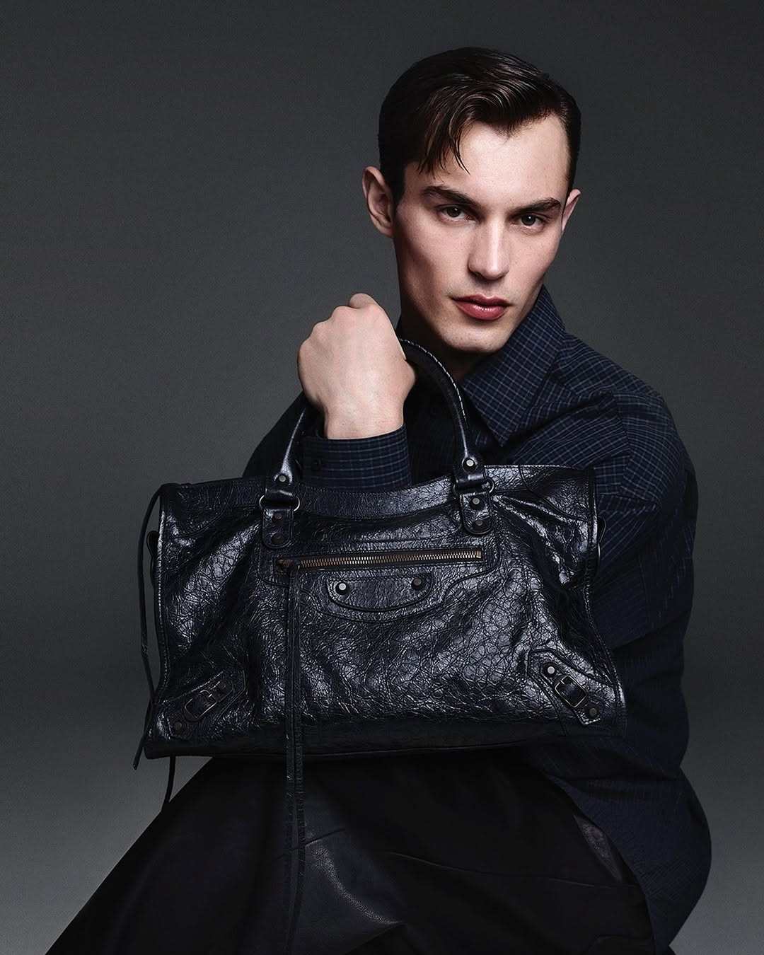 Kit Butler models Balenciaga’s Le City bag in 2024. Photo:  @kitbutlerr/Instagram
