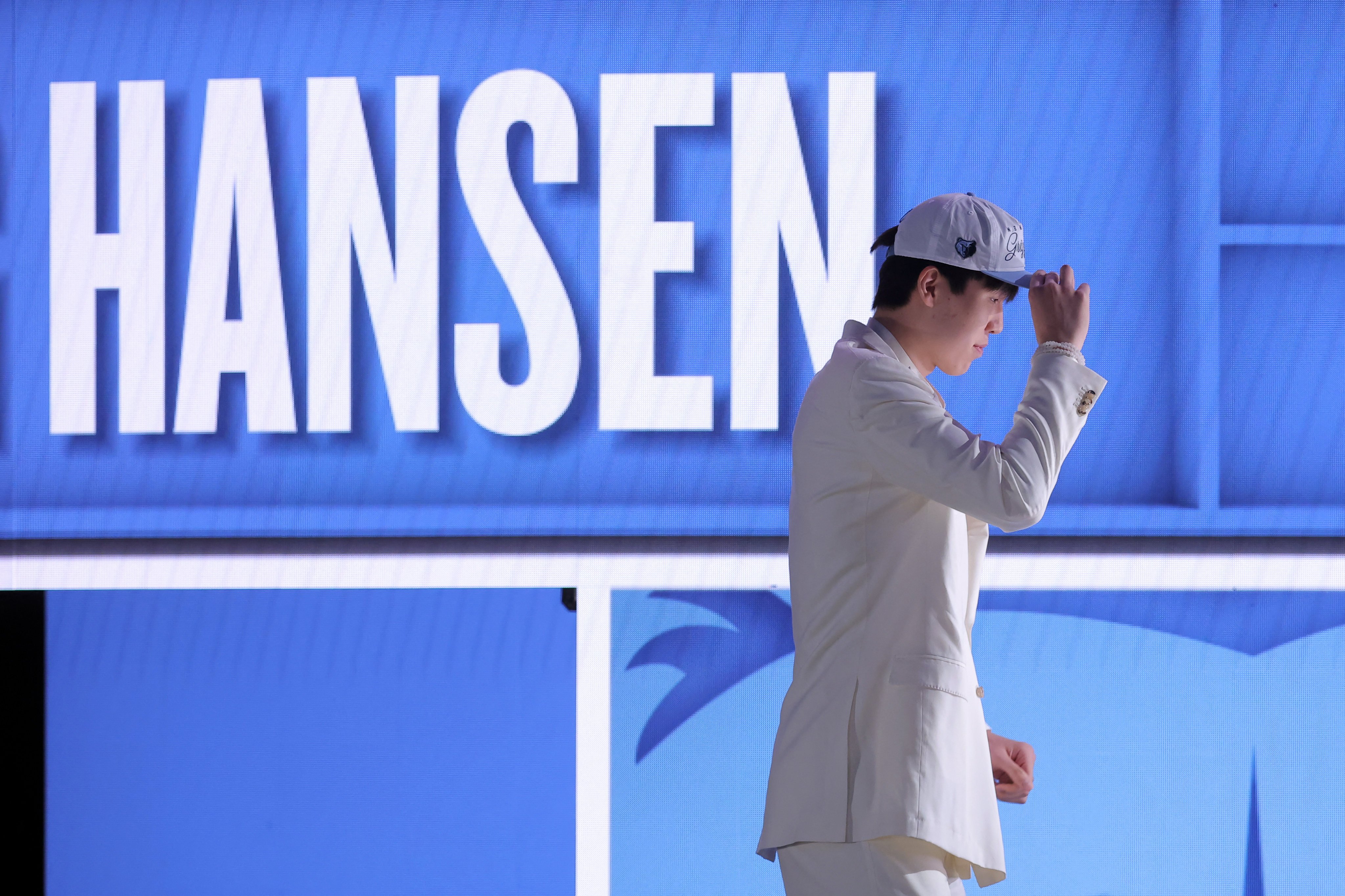 Yang Hansen on stage after being announced as the draft’s 16th pick. Photo: Imagn Images via Reuters Connect