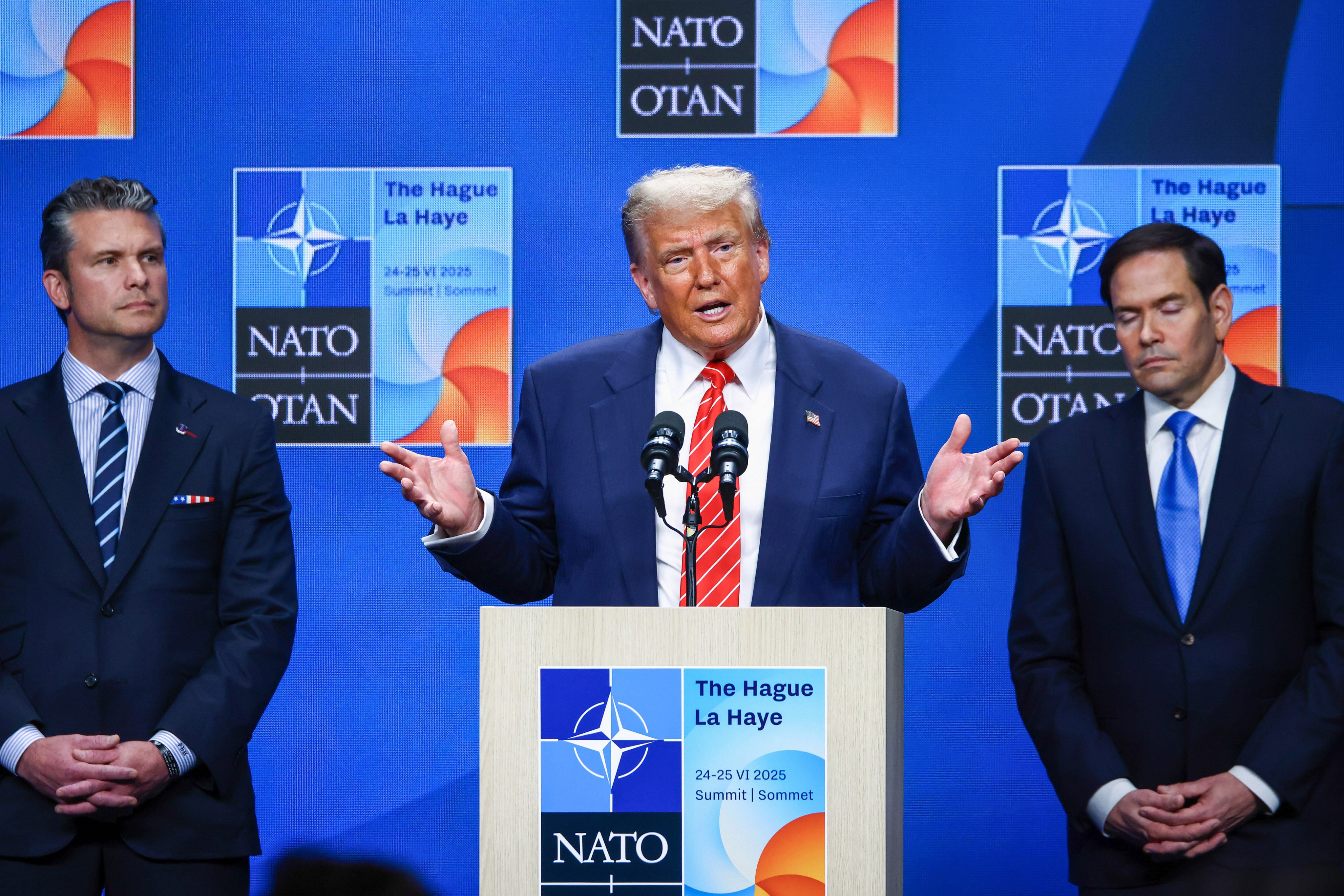 US President Donald Trump. flanked by Defence Secretary Pete Hegseth and Secretary of State Marco Rubio, discussing the US air strike on Iran nuclear facilities during the NATO summit in The Hague on Wednesday. Photo: Zuma Press Wire/dpa