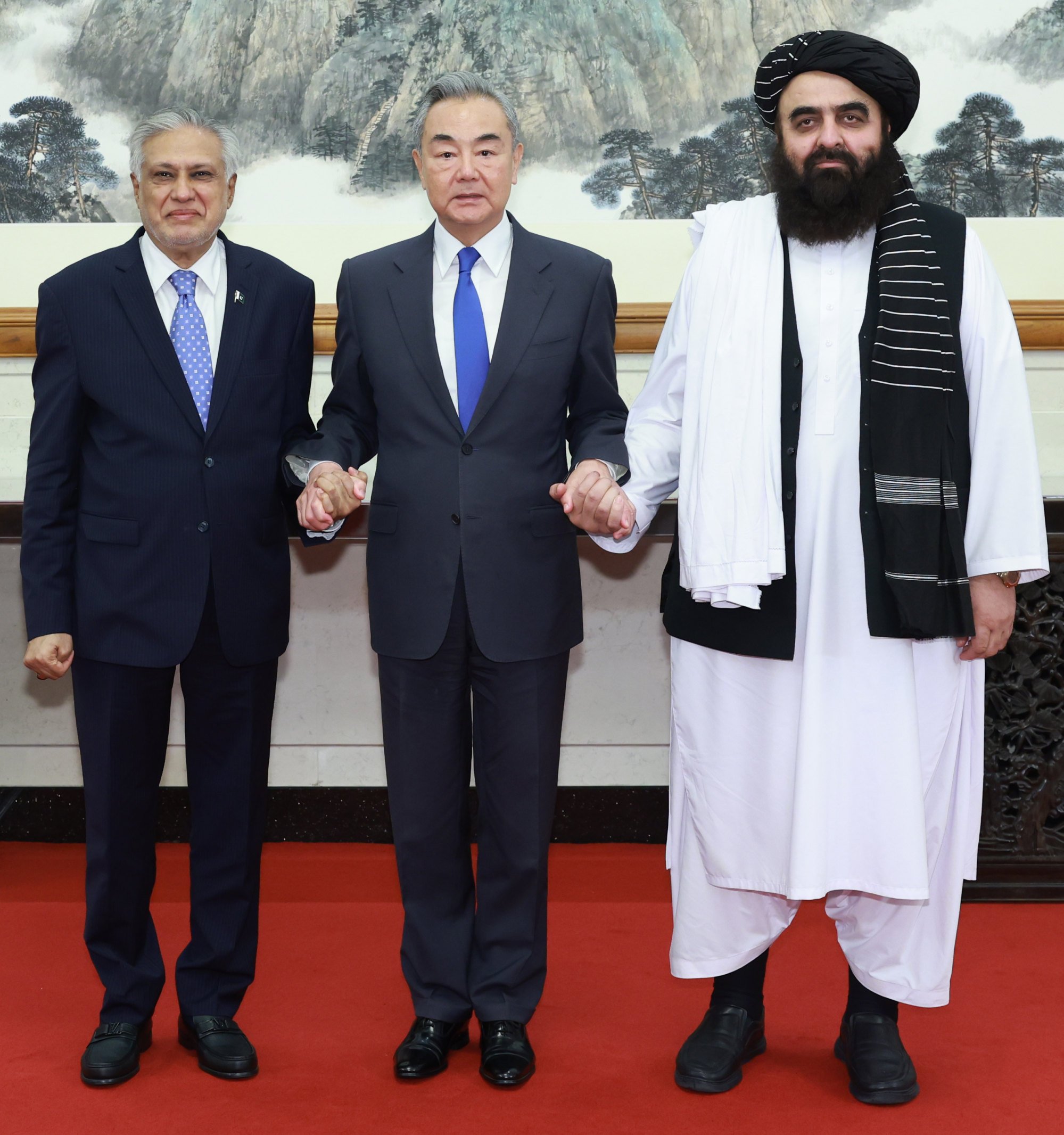 Chinese Foreign Minister Wang Yi (centre) holds an informal meeting with Pakistani Deputy Prime Minister and Foreign Minister Mohammad Ishaq Dar (left) and Afghan Acting Foreign Minister Amir Khan Muttaqi in Beijing on May 21. Photo: Wang Ye Chinese Foreign Minister Wang Yi (centre) holds an informal meeting with Pakistani Deputy Prime Minister and Foreign Minister Mohammad Ishaq Dar (left) and Afghan Acting Foreign Minister Amir Khan Muttaqi in Beijing on May 21. Photo: Wang Ye
