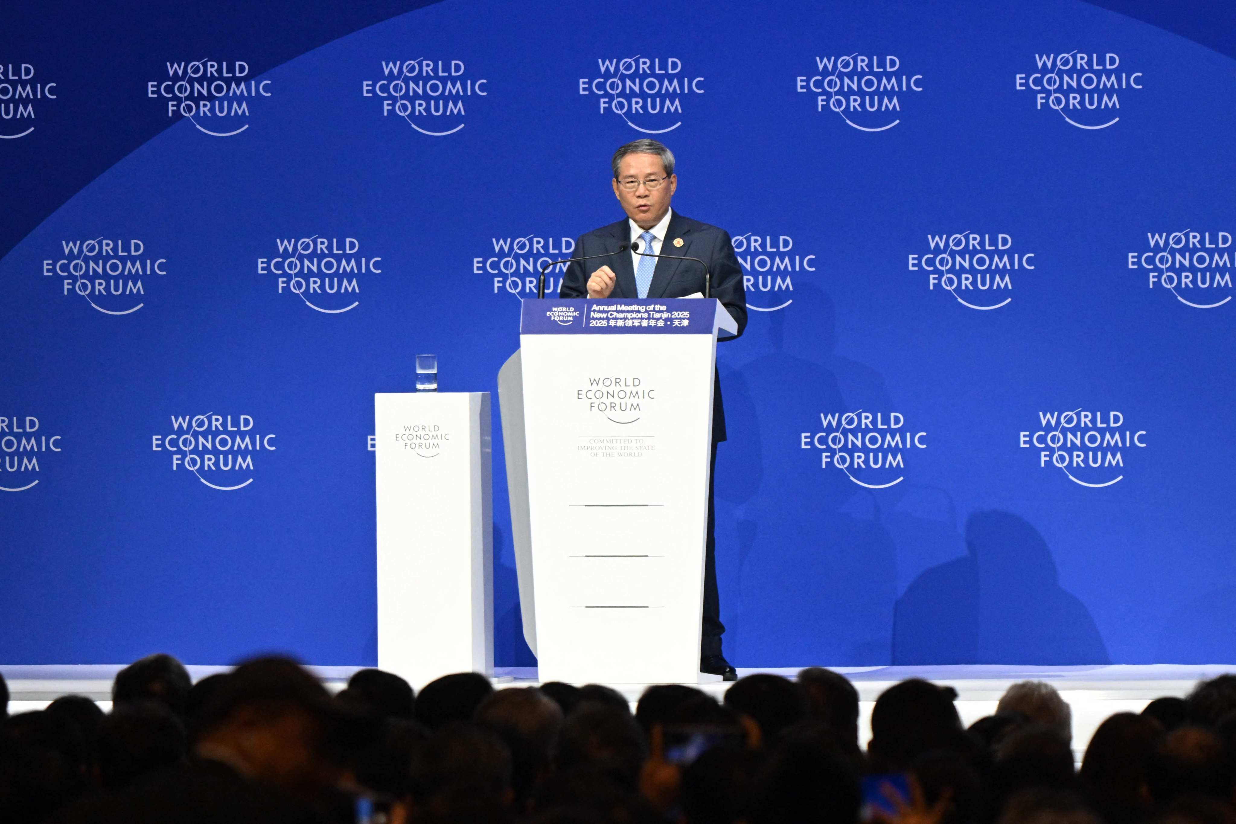 Chinese Premier Li Qiang delivers a speech at  the World Economic Forum in Tianjin on June 25, 2025. Photo: AFP