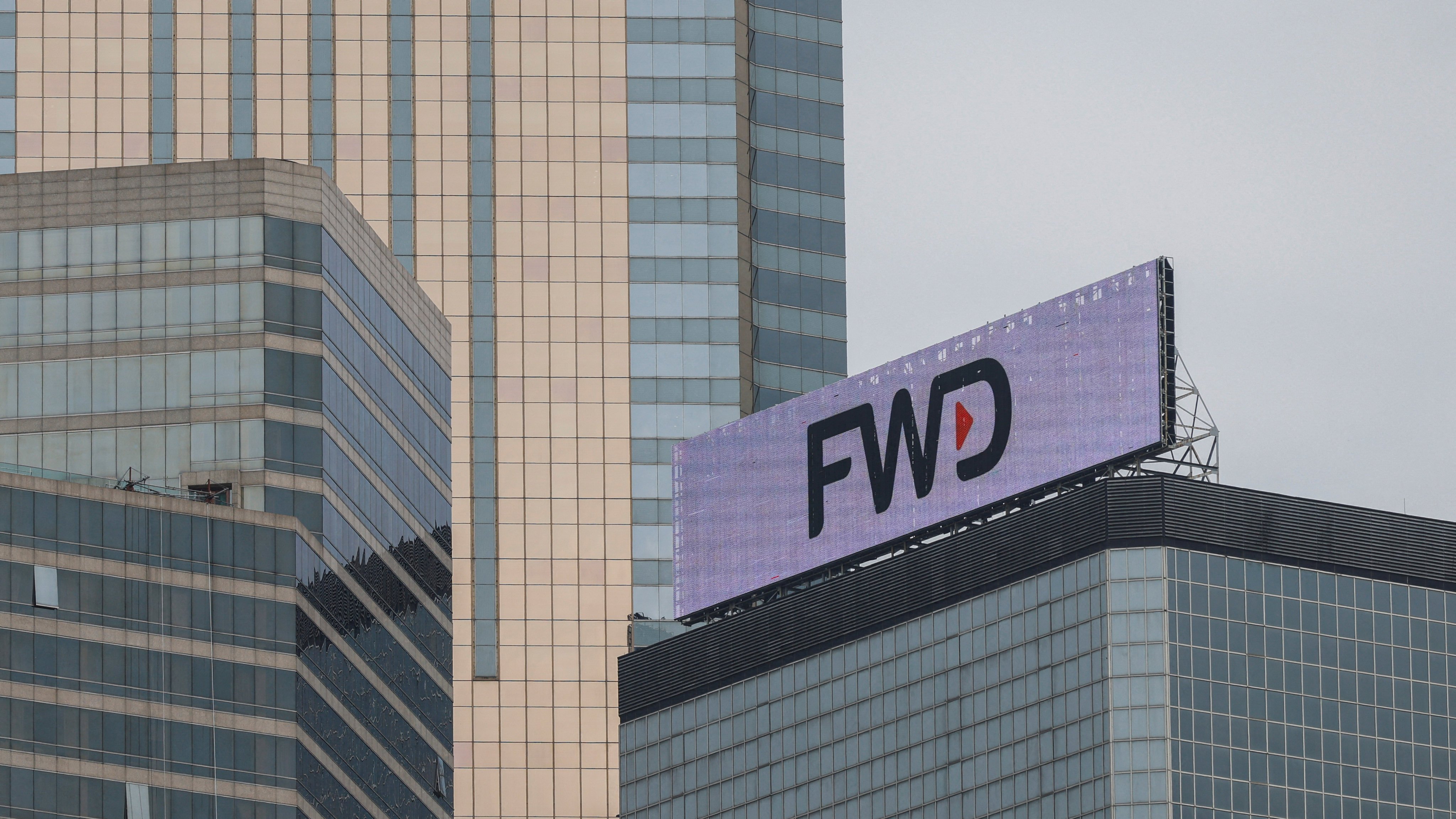 FWD’s corporate logo atop its main building in Hong Kong. Photo: Reuters