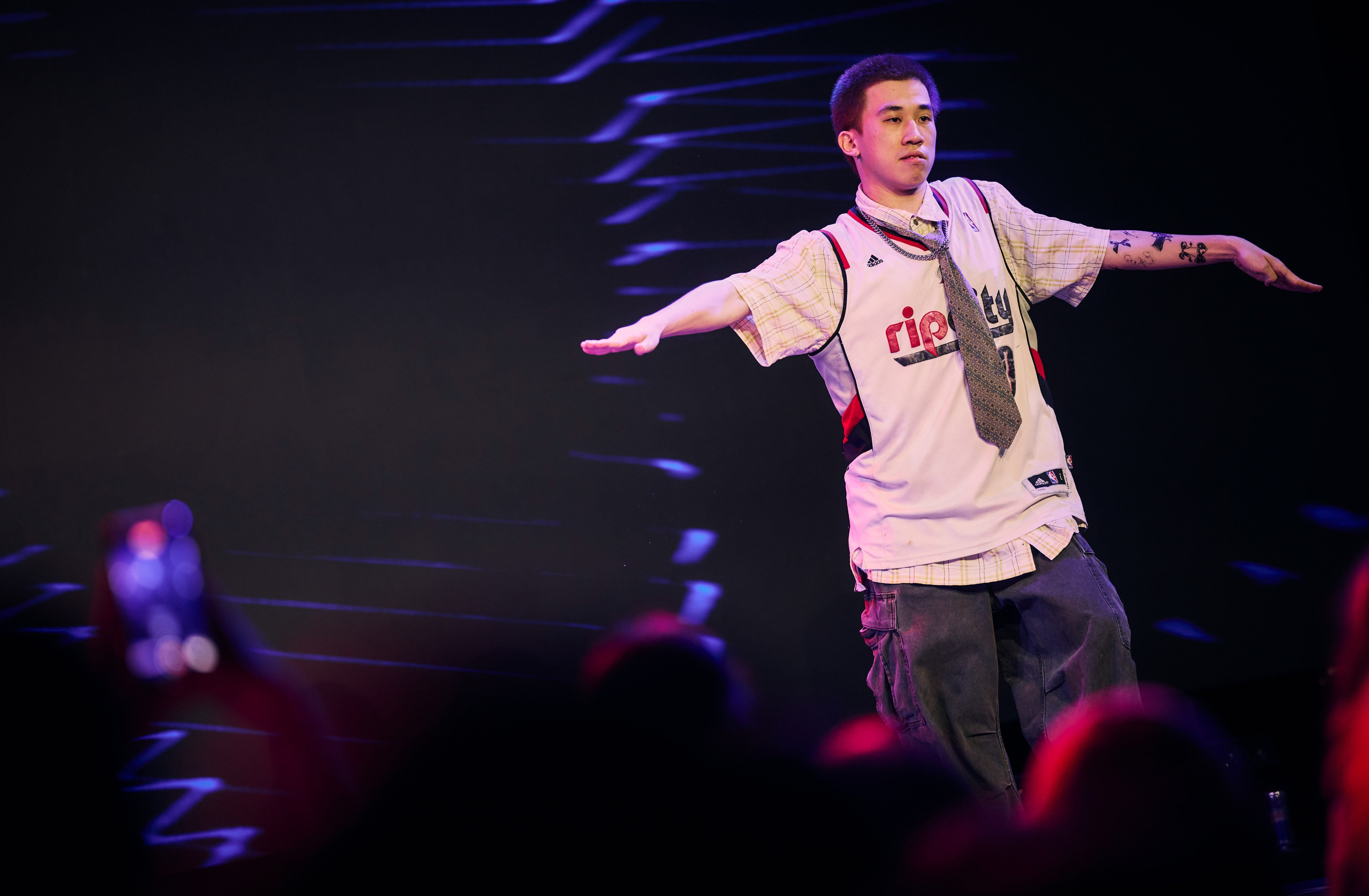 Chow Cheuk-Wing, Champion of the Hong Kong Red Bull Dance Your Style 2025 University Qualifier, performing on stage, PORTAL Hong Kong, San Po Kong, Hong Kong. 12APR25 Photo: LEWIMAGE