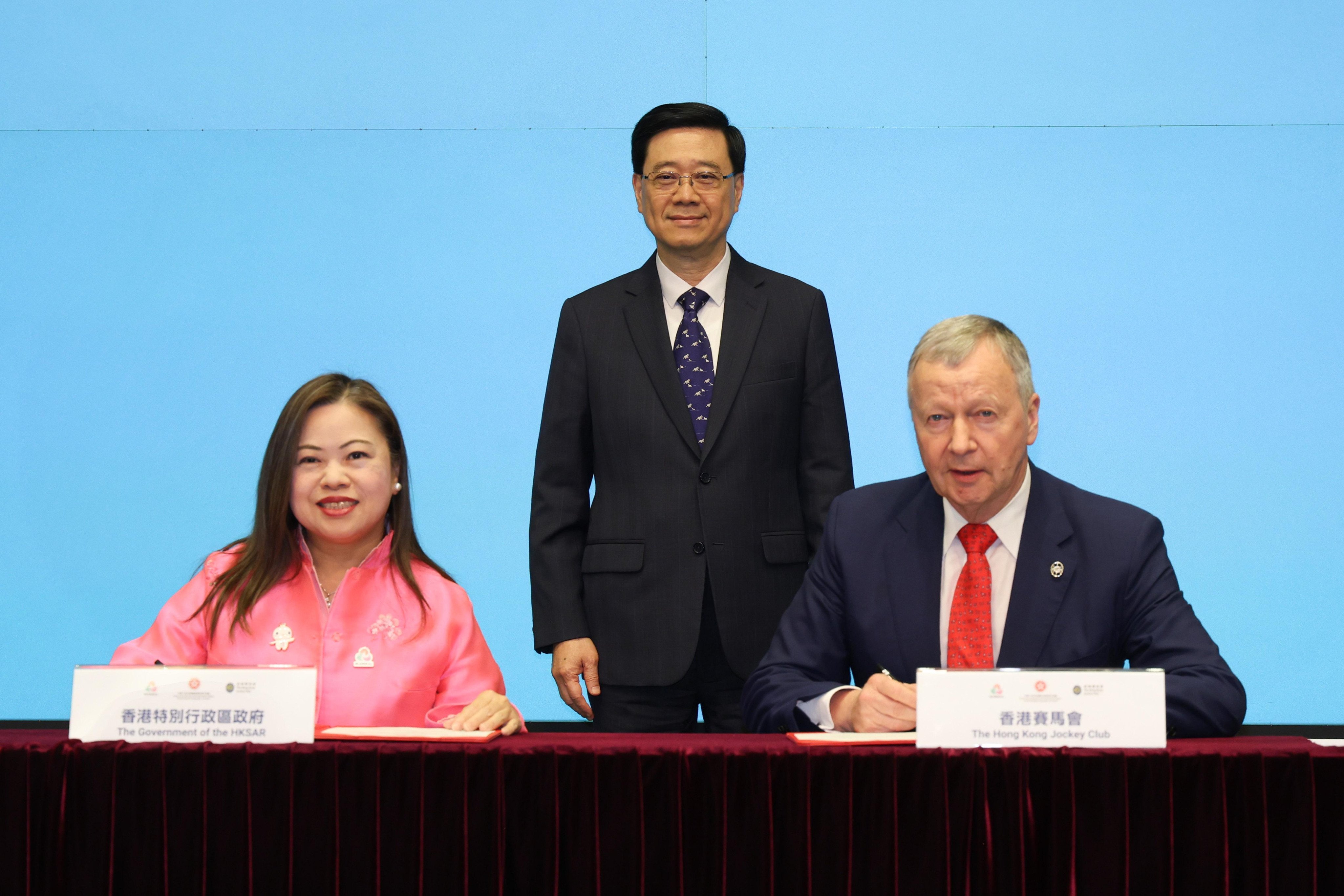 (From the left) Sports minister Rosanna Law, Chief Executive John Lee and Jockey Club CEO Winfried Engelbrecht-Bresges at the signing ceremony. Photo: Handout