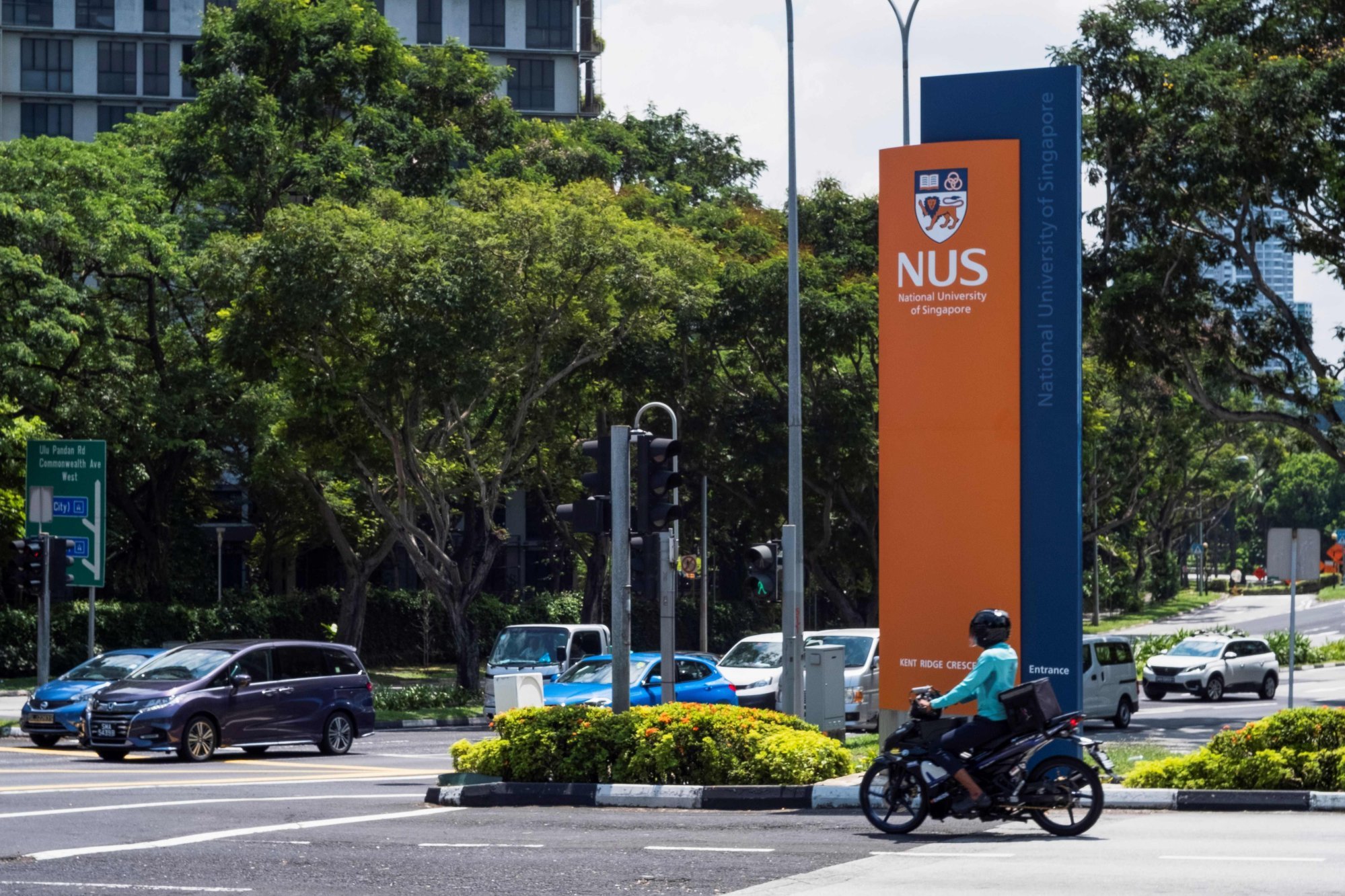 A National University of Singapore sign is displayed at the campus entrance in Singapore. The university says students who submit AI-generated work without proper acknowledgement will be committing plagiarism. Photo: AFP A National University of Singapore sign is displayed at the campus entrance in Singapore. The university says students who submit AI-generated work without proper acknowledgement will be committing plagiarism. Photo: AFP