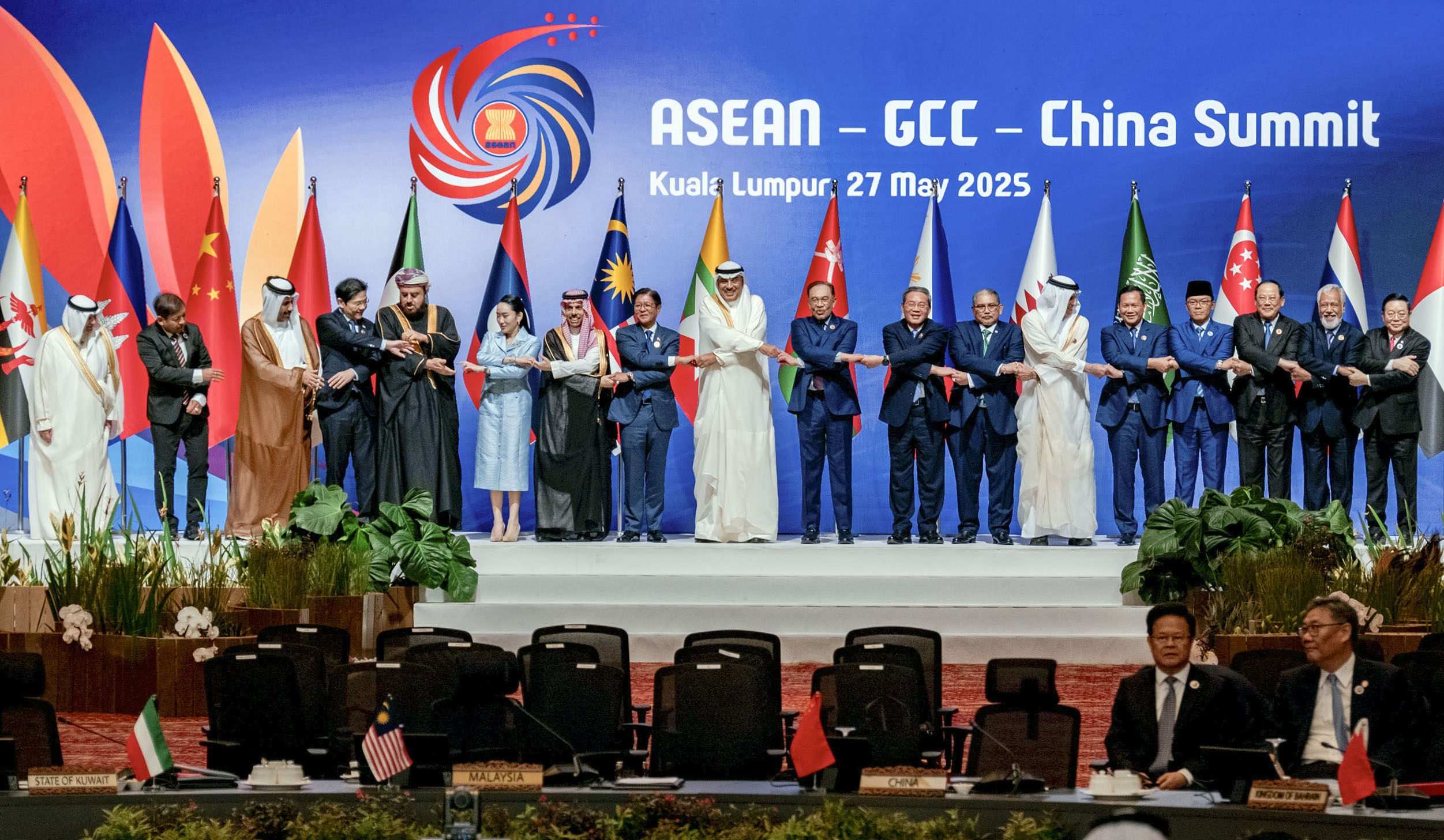Leaders of the Association of Southeast Asian Nations, Gulf Cooperation Council and China join hands for a group photo as they meet for a summit in Kuala Lumpur, Malaysia, on May 27. Photo: Kyodo