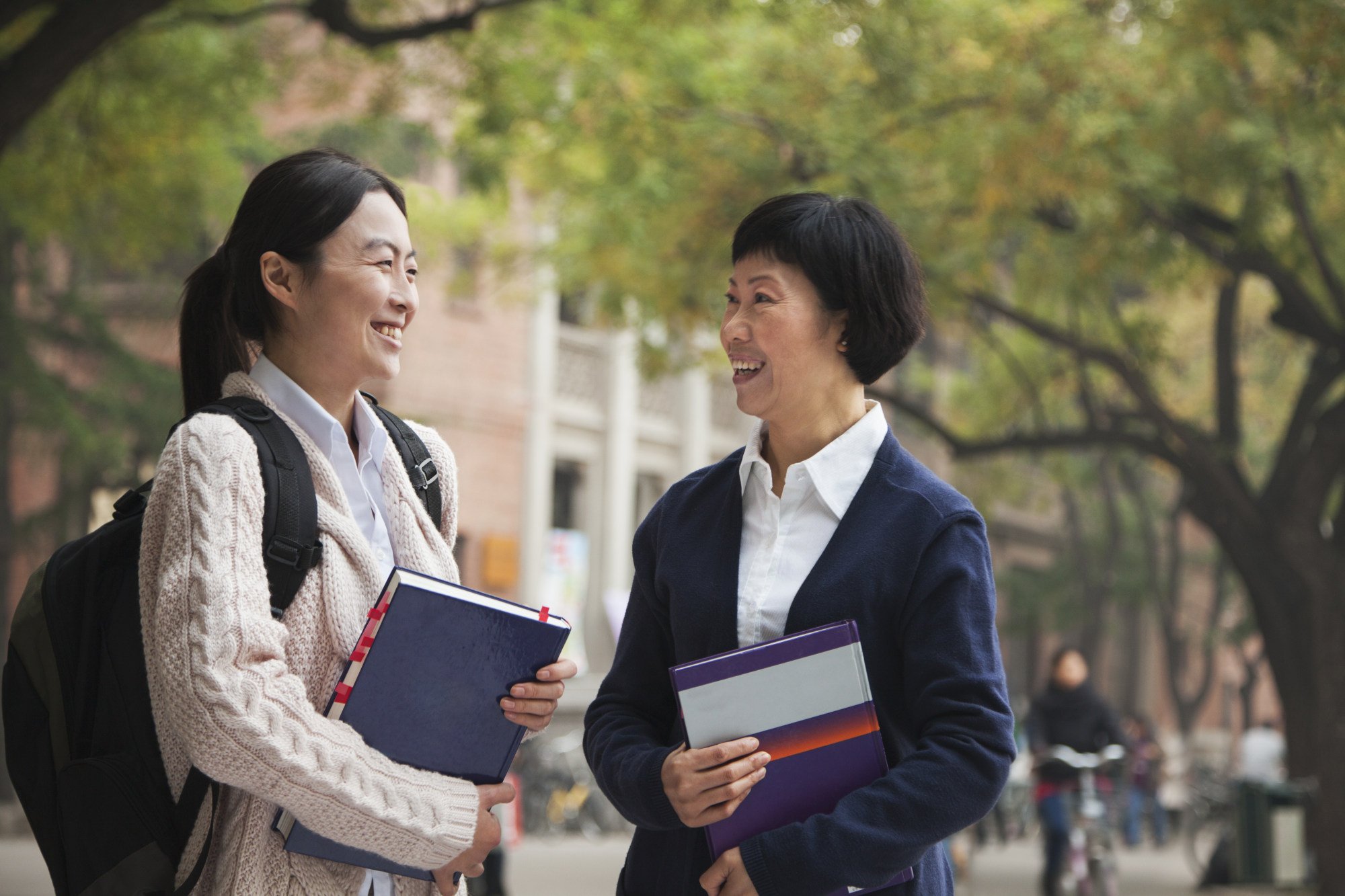 A university student and her professor. Experts have urged educators to exercise nuance and improve their knowledge of AI tools. Photo: Shutterstock A university student and her professor. Experts have urged educators to exercise nuance and improve their knowledge of AI tools. Photo: Shutterstock