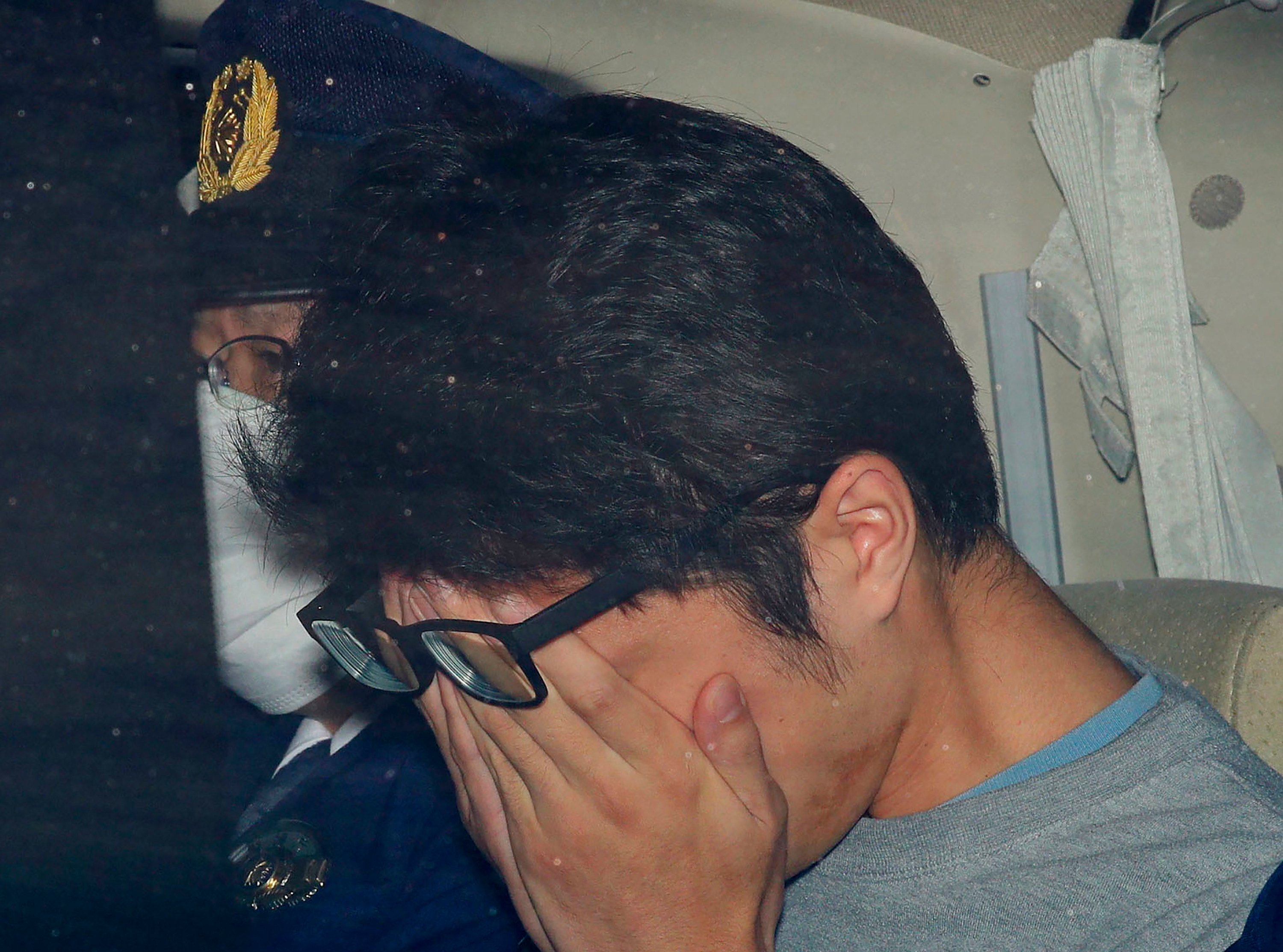 Takahiro Shiraishi leaving a police station in 2017. File photo: Kyodo via AP