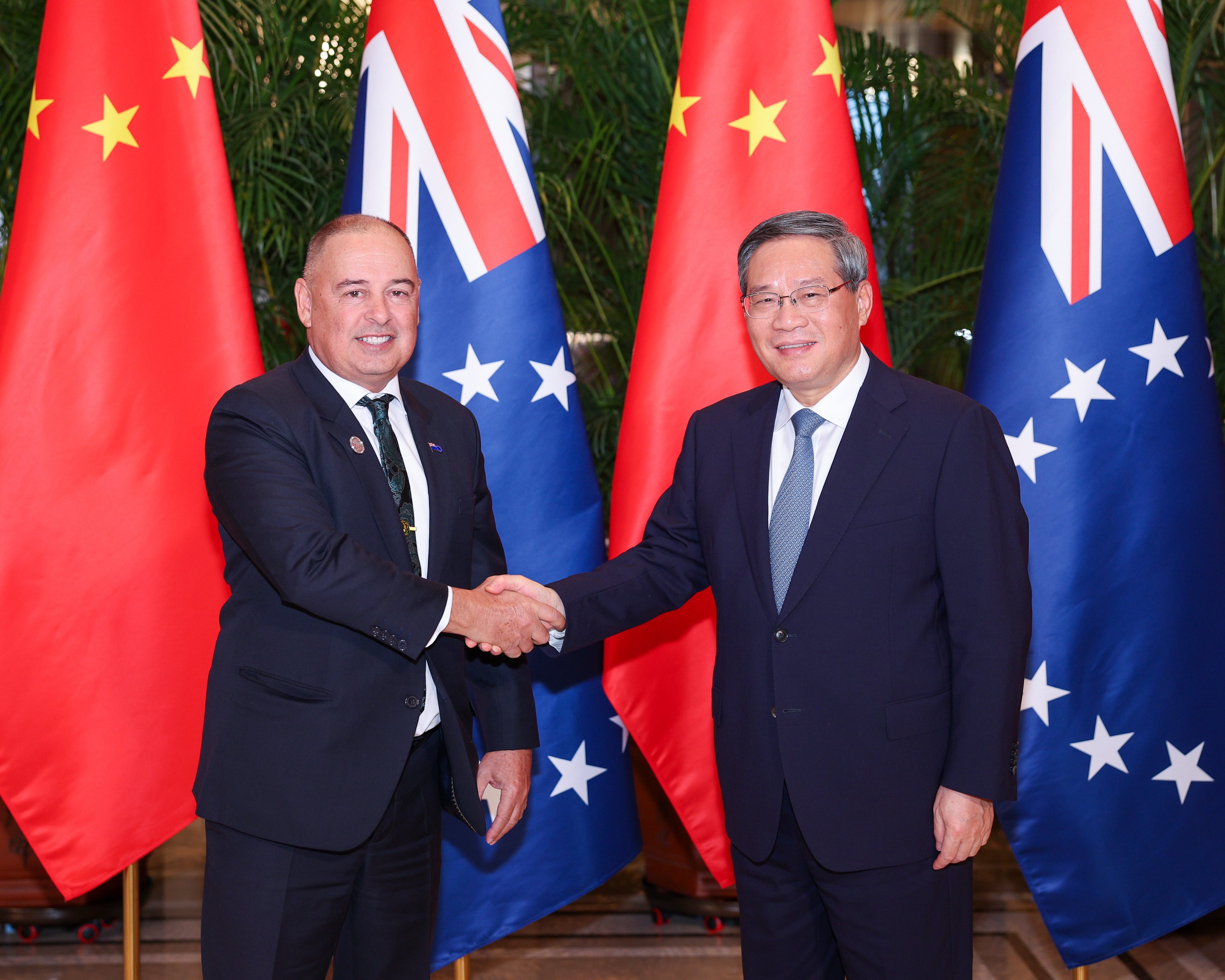 Chinese Premier Li Qiang shakes hands with Cook Islands Prime Minister Mark Brown in February. Photo: Xinhua