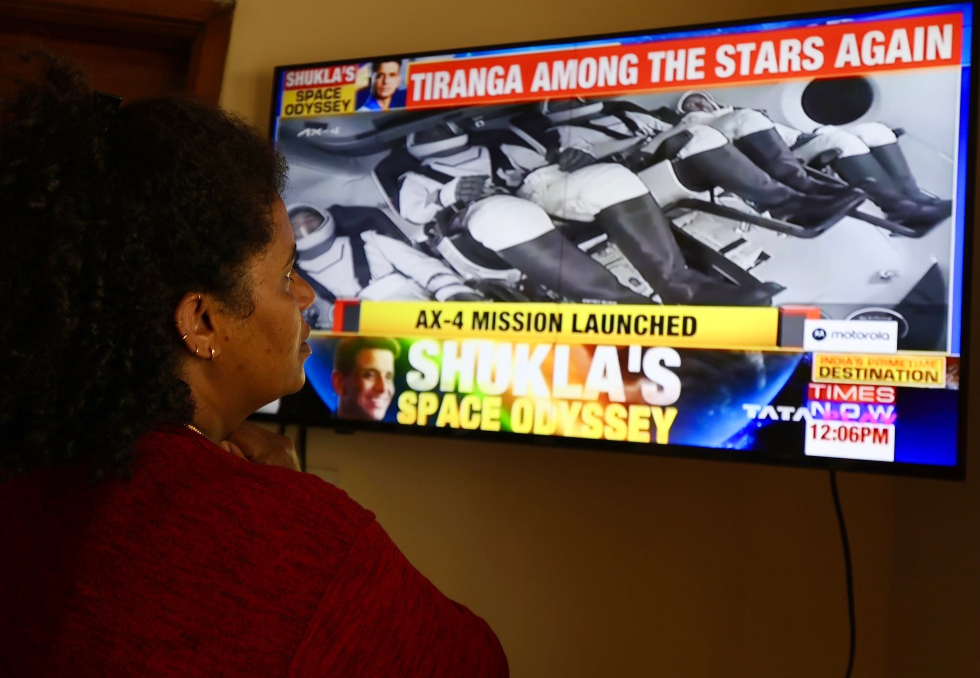 An Indian woman in Bengaluru watches coverage of the Axiom-4 mission successfully lifting off from Launch Complex 39A at Nasa’s Kennedy Space Centre in Florida on Wednesday. Photo: EPA An Indian woman in Bengaluru watches coverage of the Axiom-4 mission successfully lifting off from Launch Complex 39A at Nasa’s Kennedy Space Centre in Florida on Wednesday. Photo: EPA
