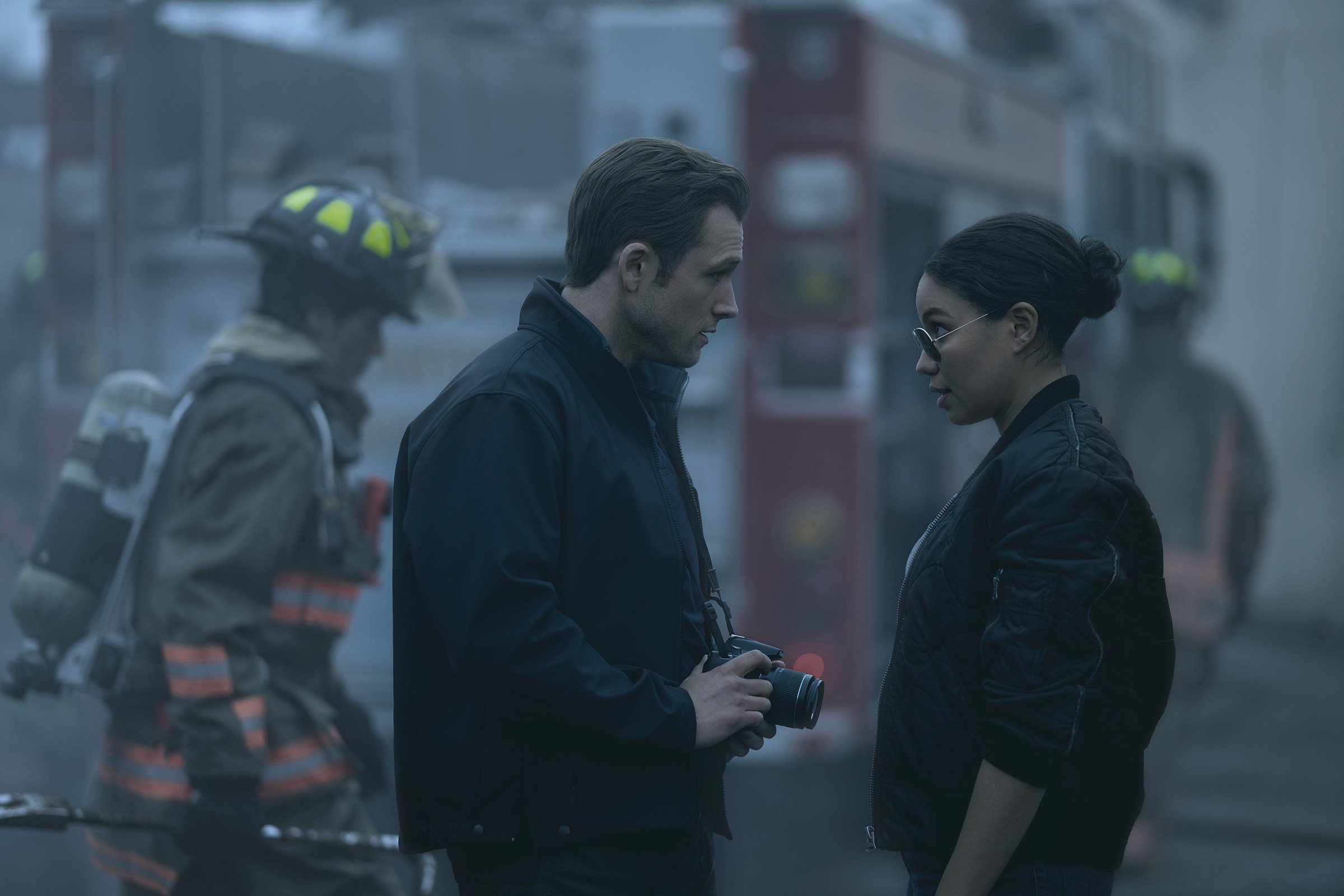 Taron Egerton (centre) and Jurnee Smollett (right) in a still from Smoke. Photo: TNS