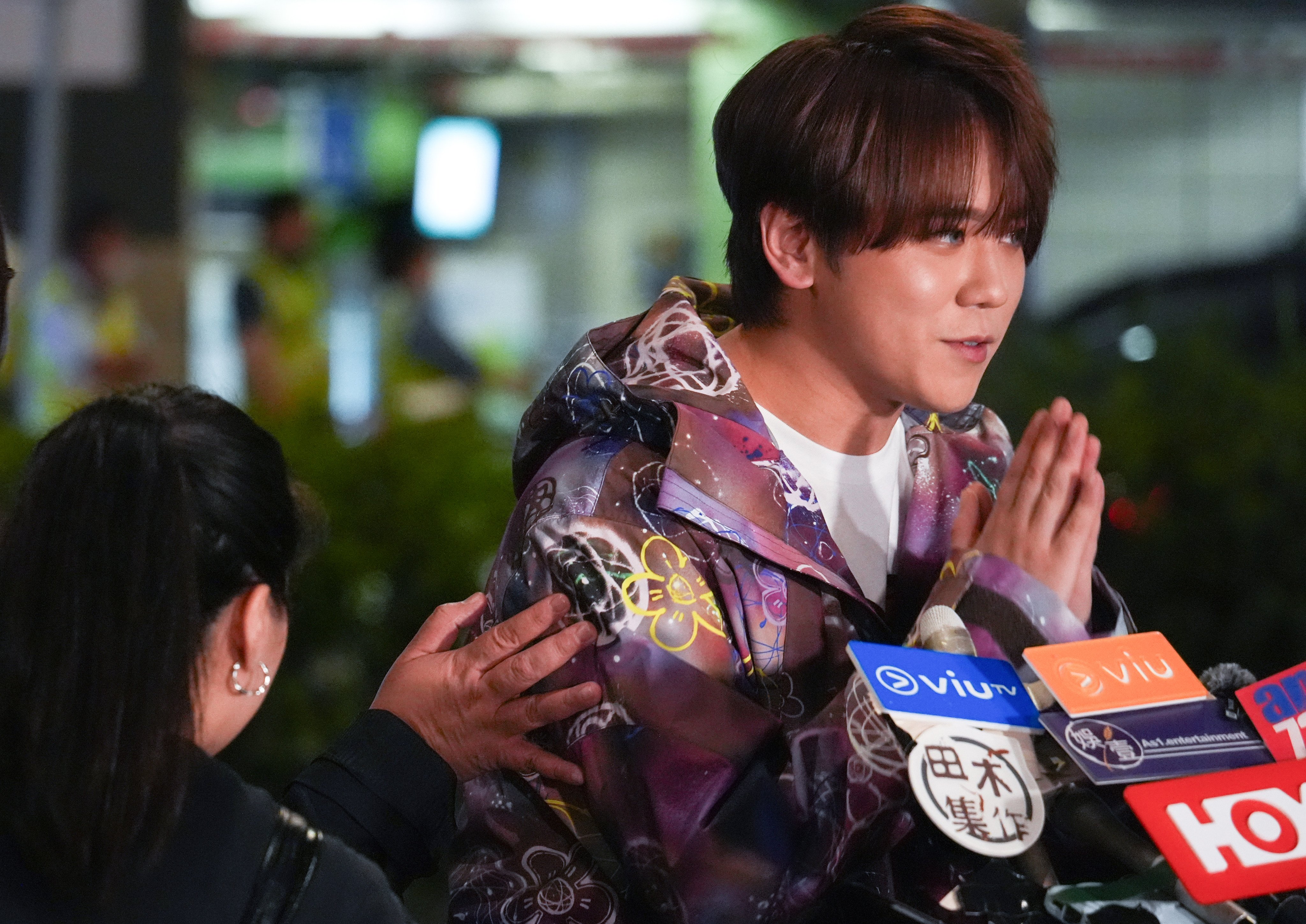 Pop star Keung To speaks to the media at Hong Kong International Airport ahead of a trip to France earlier this week. Photo: Eugene Lee