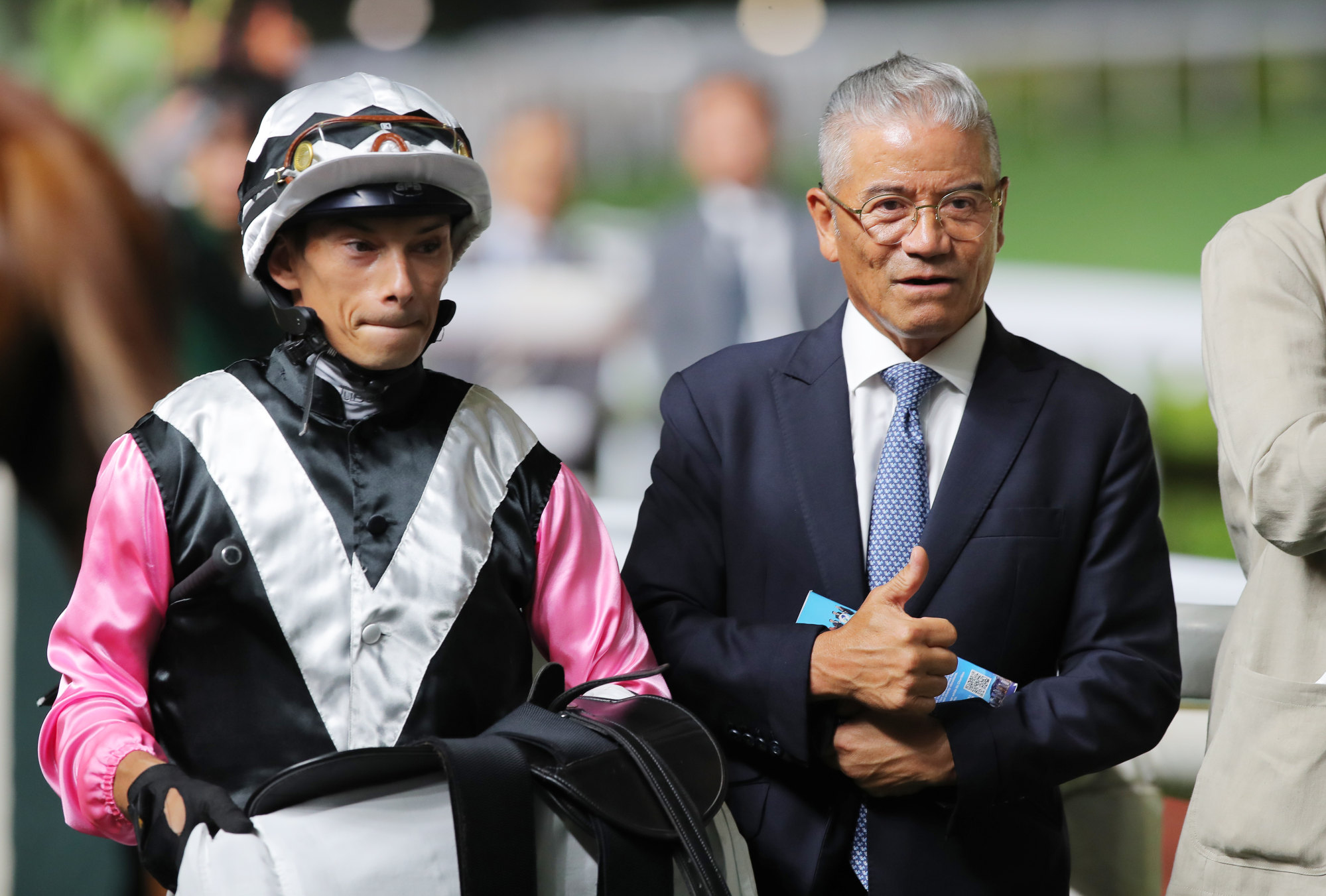 Jockey Alexis Badel and trainer Tony Cruz after Beauty Waves’ win.