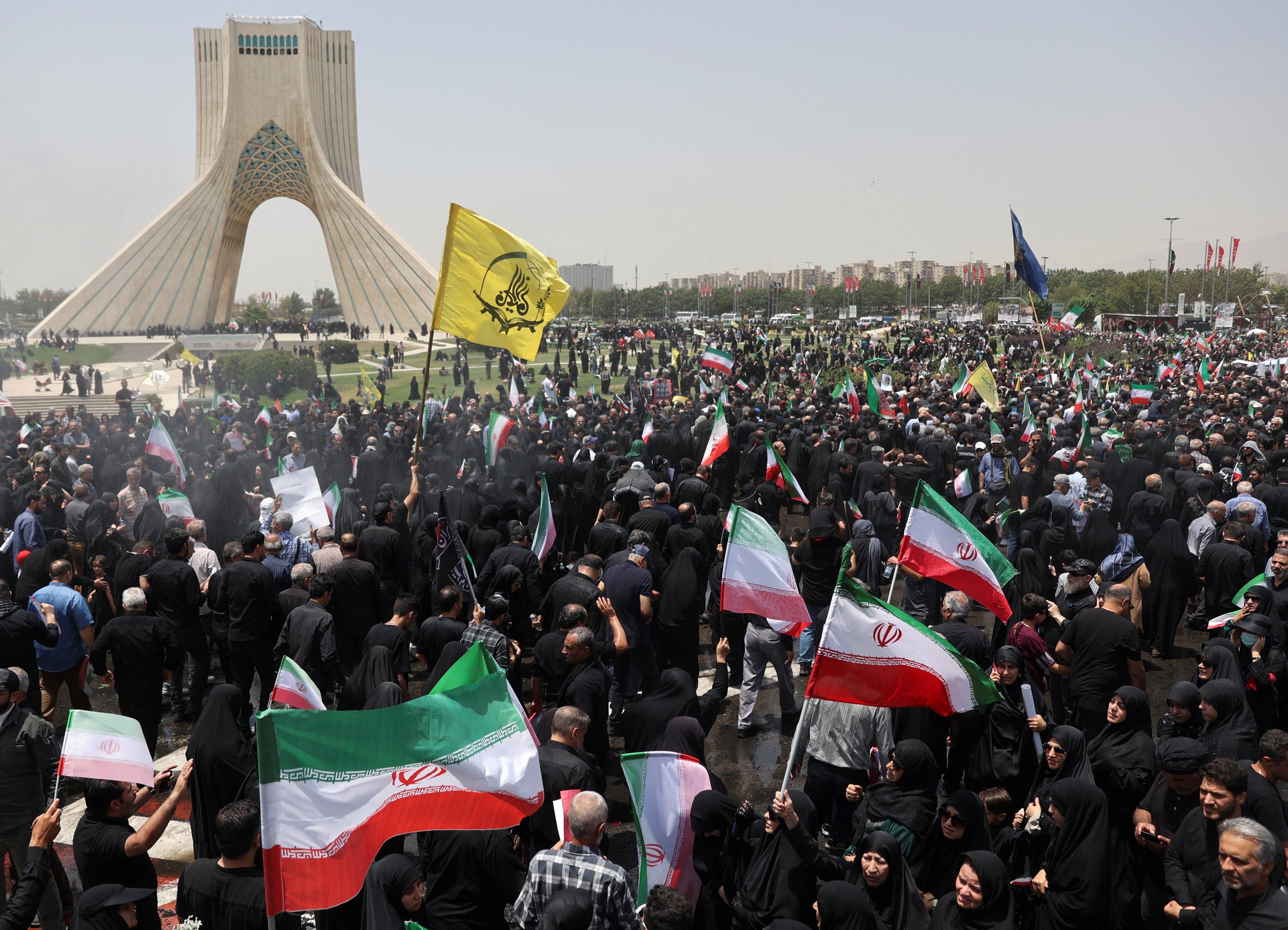 Crowds gather in Tehran on Saturday for the funeral procession of Iranian military commanders, nuclear scientists and others killed in Israeli strikes. Photo: WANA via Reuters