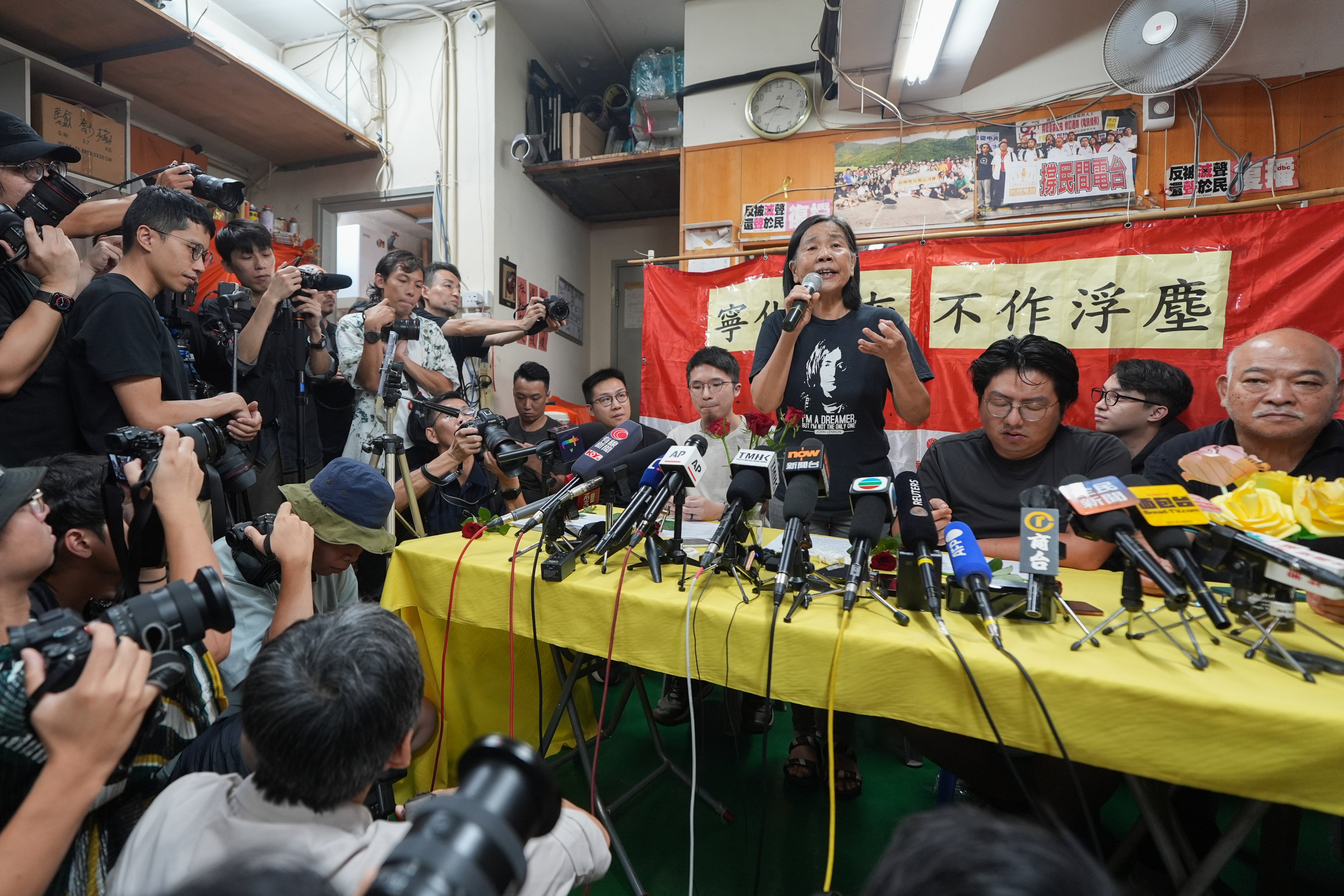 League of Social Democrats leader Chan Po-ying (front row, third from right) and other committee members announce the party’s disbandment on Sunday. Photo: Eugene Lee