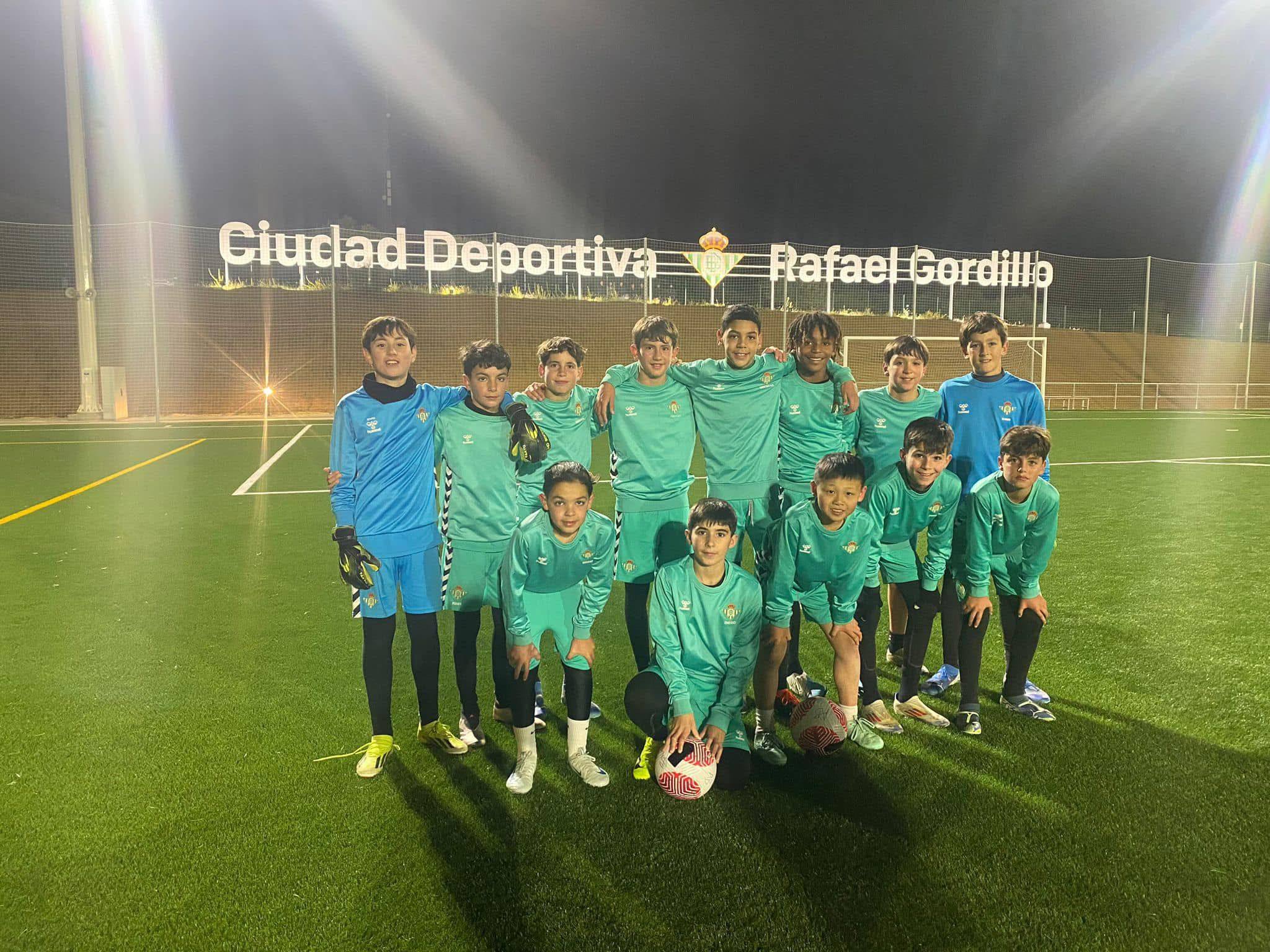 Johnny So (front row, centre) at training with Real Betis’ academy. Photo: Handout