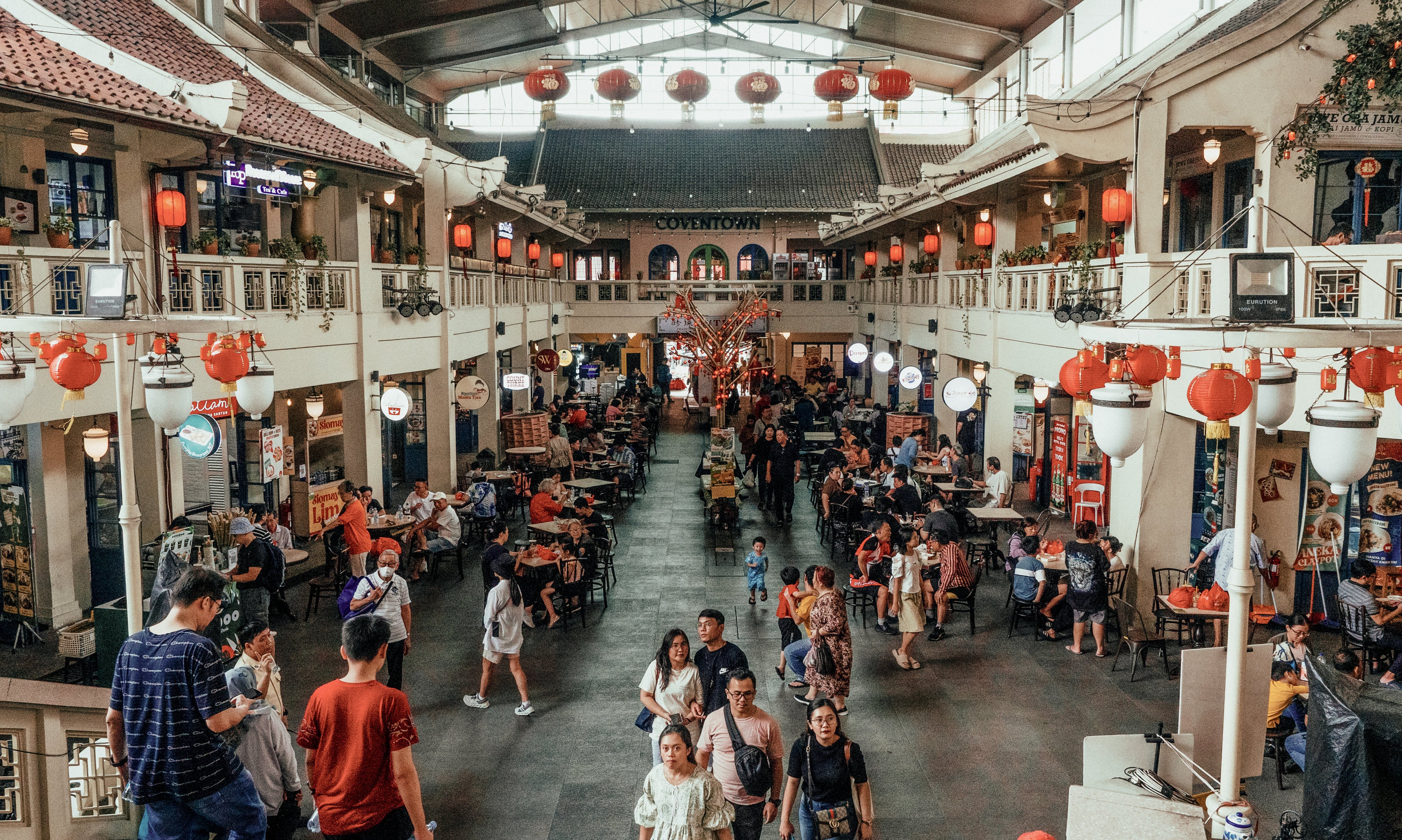 Petak Enam, in Chinatown, Jakarta, Indonesia. Petak Enam is a former car park that has been transformed into a bright and airy food court and shopping centre. Photo: Josh Edwards