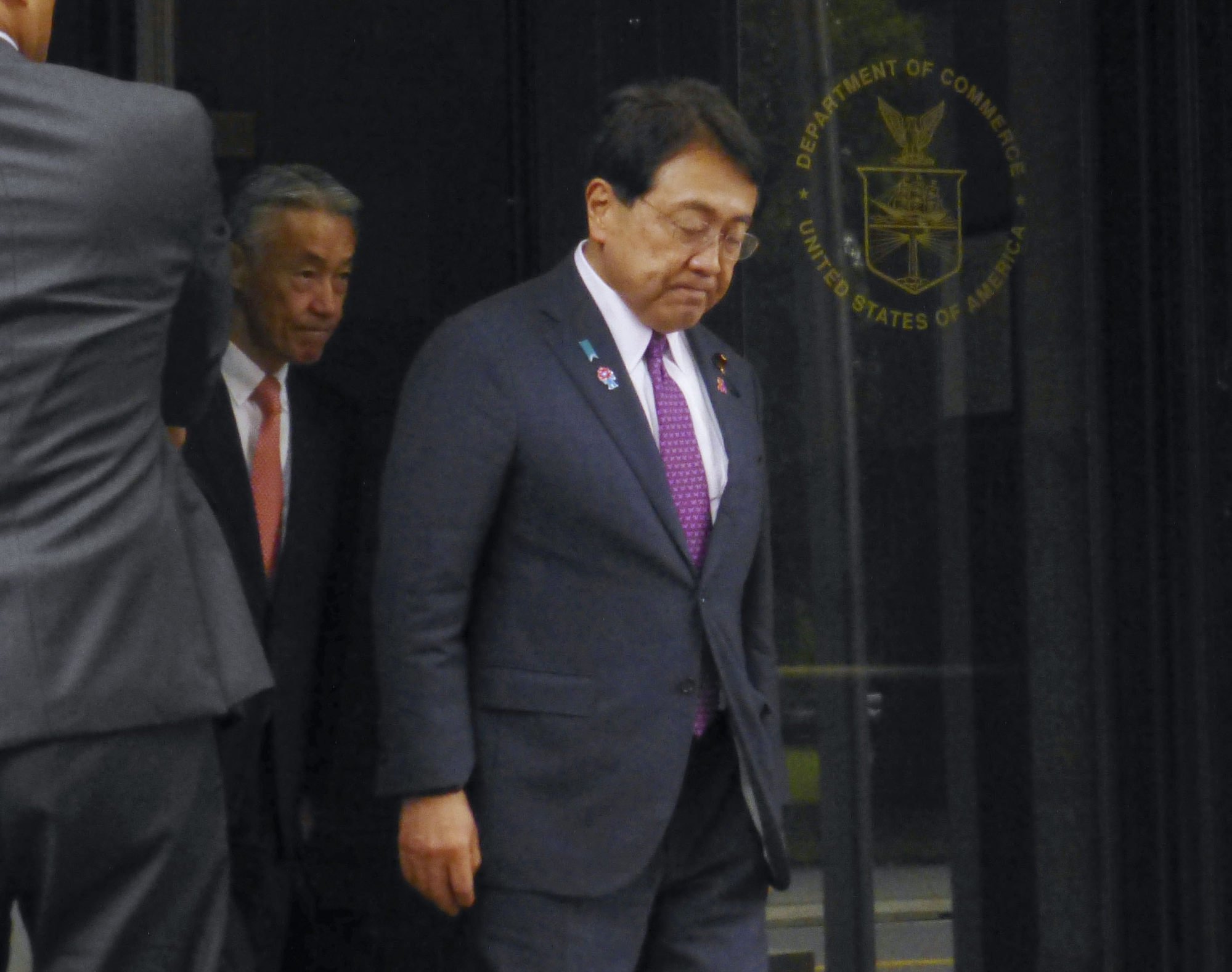 Ryosei Akazawa (right), Japan’s chief tariff negotiator, leaves the US Department of Commerce in Washington after holding talks with Commerce Secretary Howard Lutnick on Friday. Photo: Kyodo Ryosei Akazawa (right), Japan’s chief tariff negotiator, leaves the US Department of Commerce in Washington after holding talks with Commerce Secretary Howard Lutnick on Friday. Photo: Kyodo