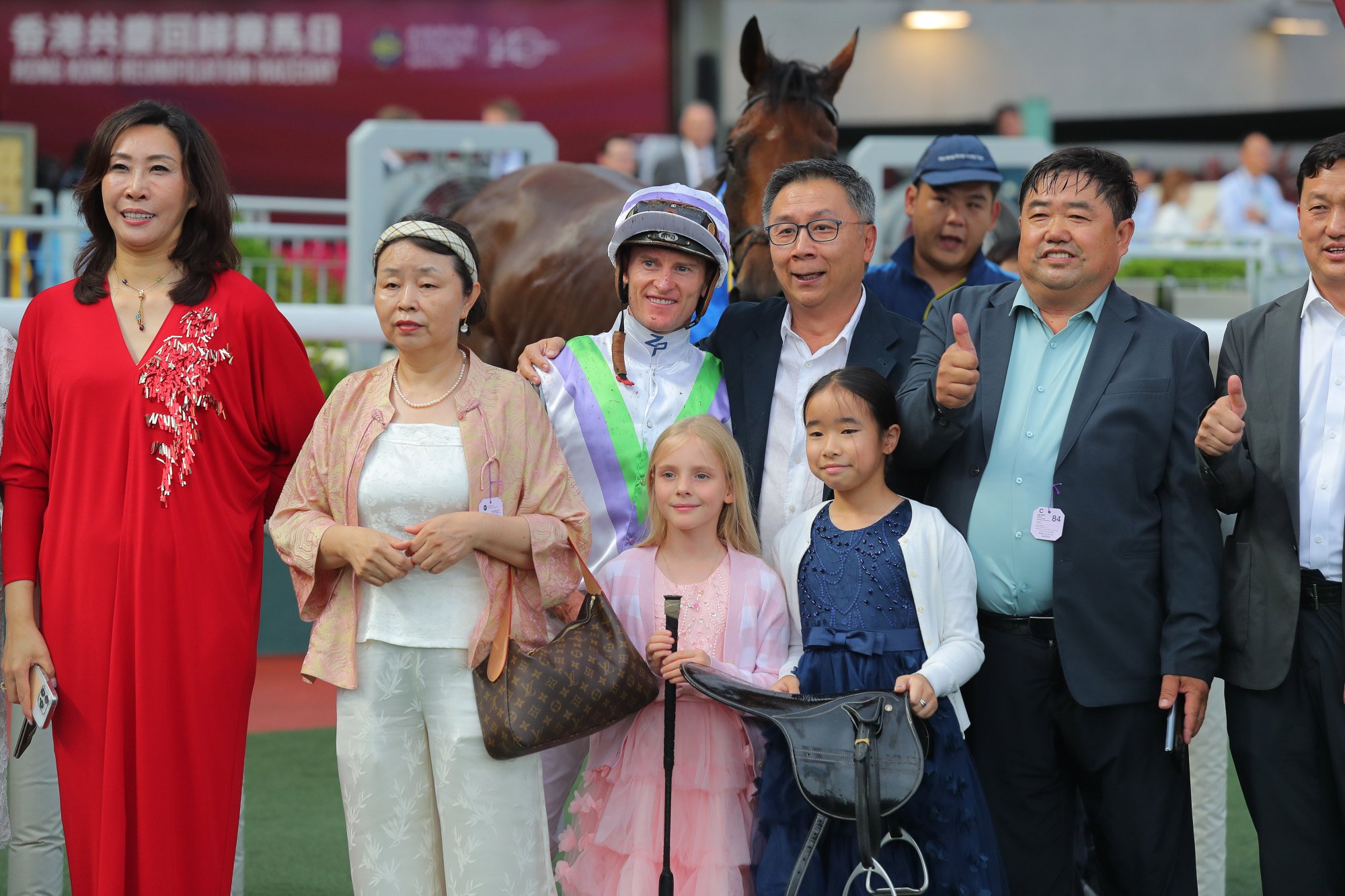 Jockey Zac Purton and connections of Light Years Charm following the galloper’s feature win.