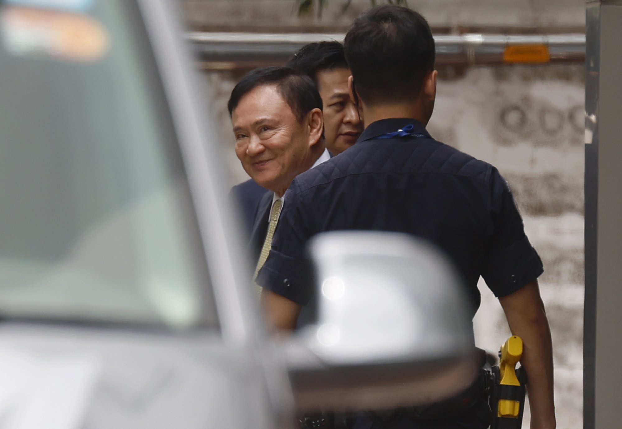 Former Thai prime minister Thaksin Shinawatra appears at court in Bangkok on Tuesday to face charges of insulting the monarchy. Photo: EPA
