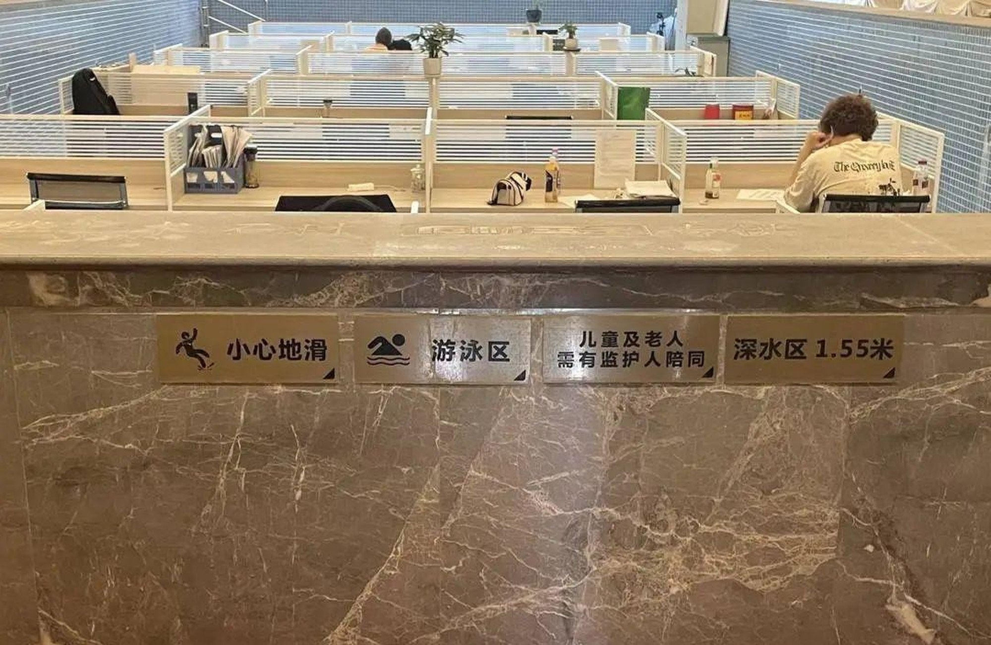 The swimming pool safety signs are clearly visible in the company’s workspace.. Photo: Handout The swimming pool safety signs are clearly visible in the company’s workspace.. Photo: Handout
