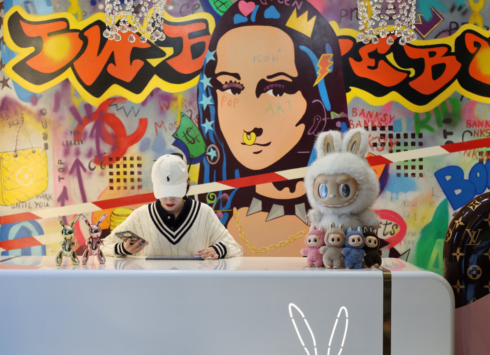 Labubu toys are placed at a host stand of a restaurant in Moscow, Russia, on June 27. Photo: Reuters Labubu toys are placed at a host stand of a restaurant in Moscow, Russia, on June 27. Photo: Reuters