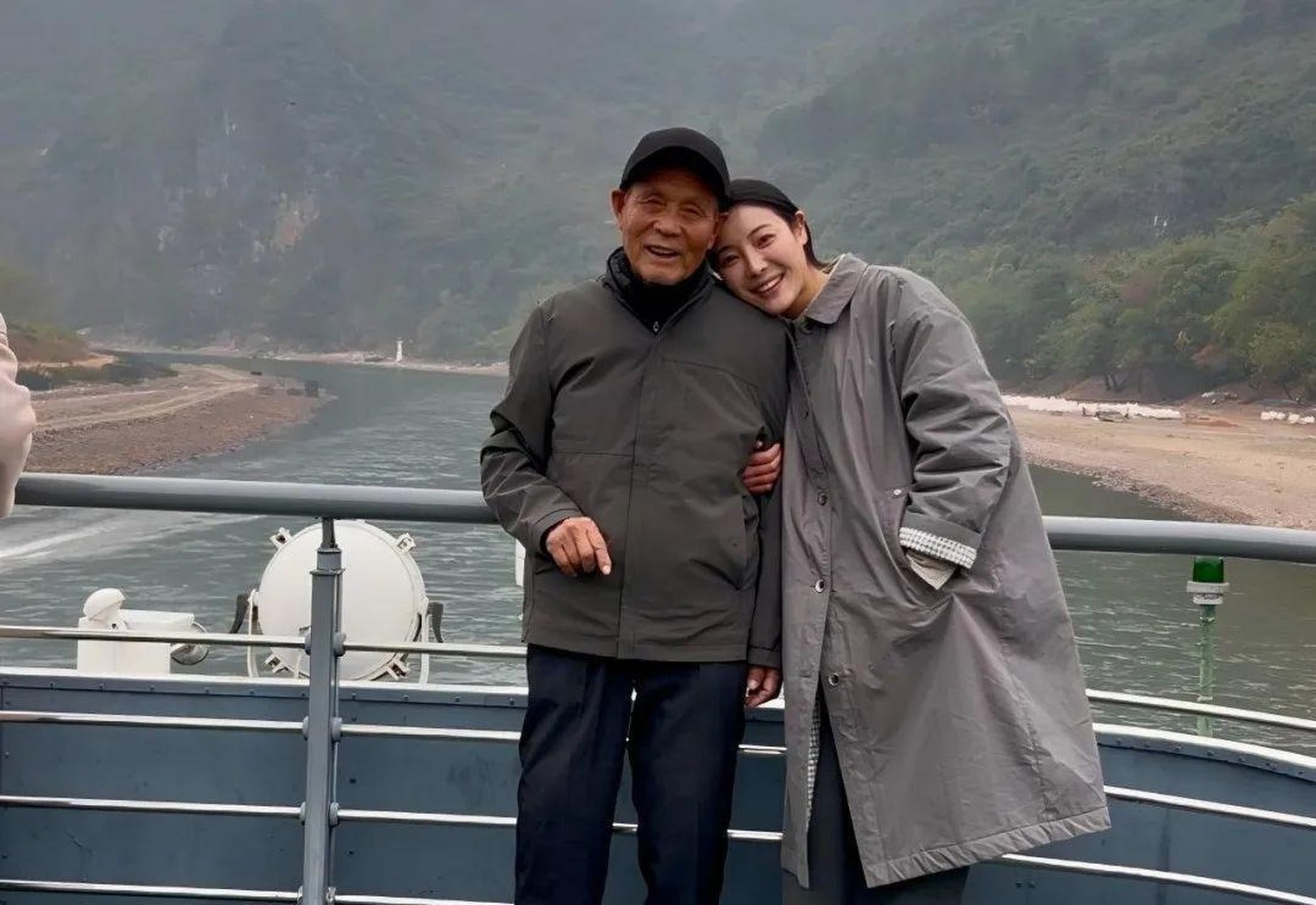Li and her grandfather, pictured with her above, take care of her parents who are both severely mentally disabled. Photo: handout
