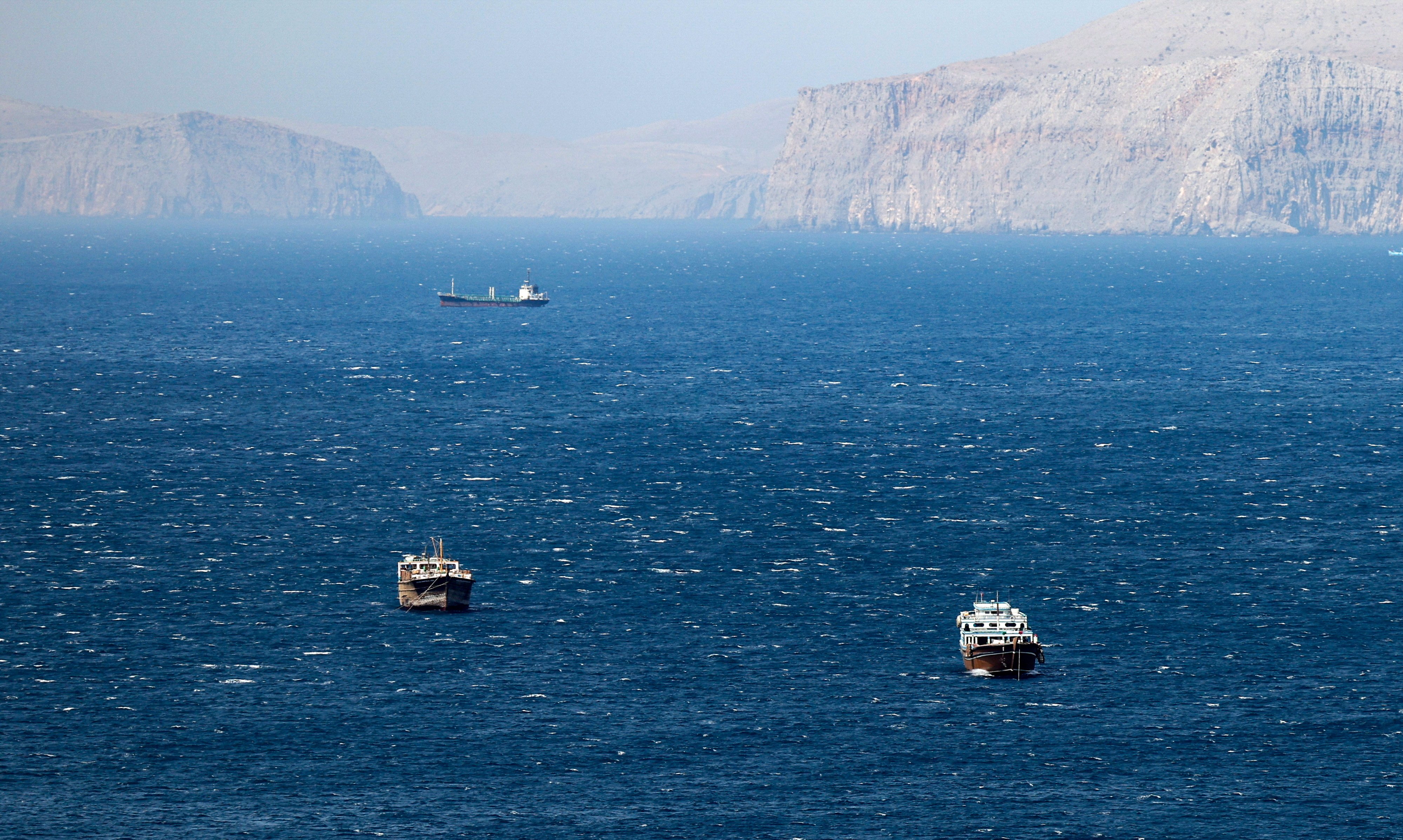 Ships in the Strait of Hormuz as seen from Khasab, Oman. Photo: EPA-EFE