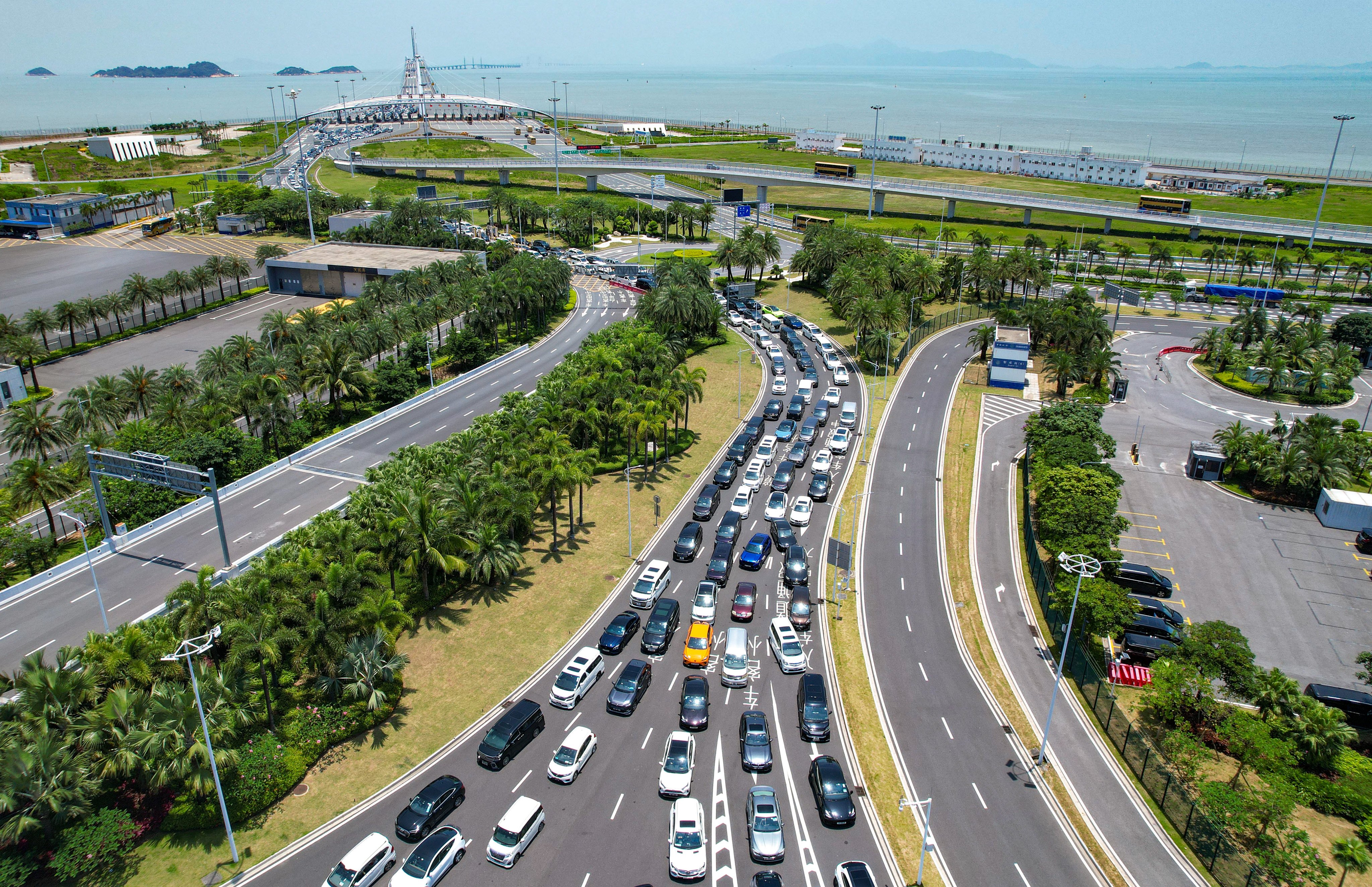 Vehicles will be allowed to enter the city via the Hong Kong-Zhuhai-Macau Bridge, with a daily quota of 100 applications. Photo: Xinhua