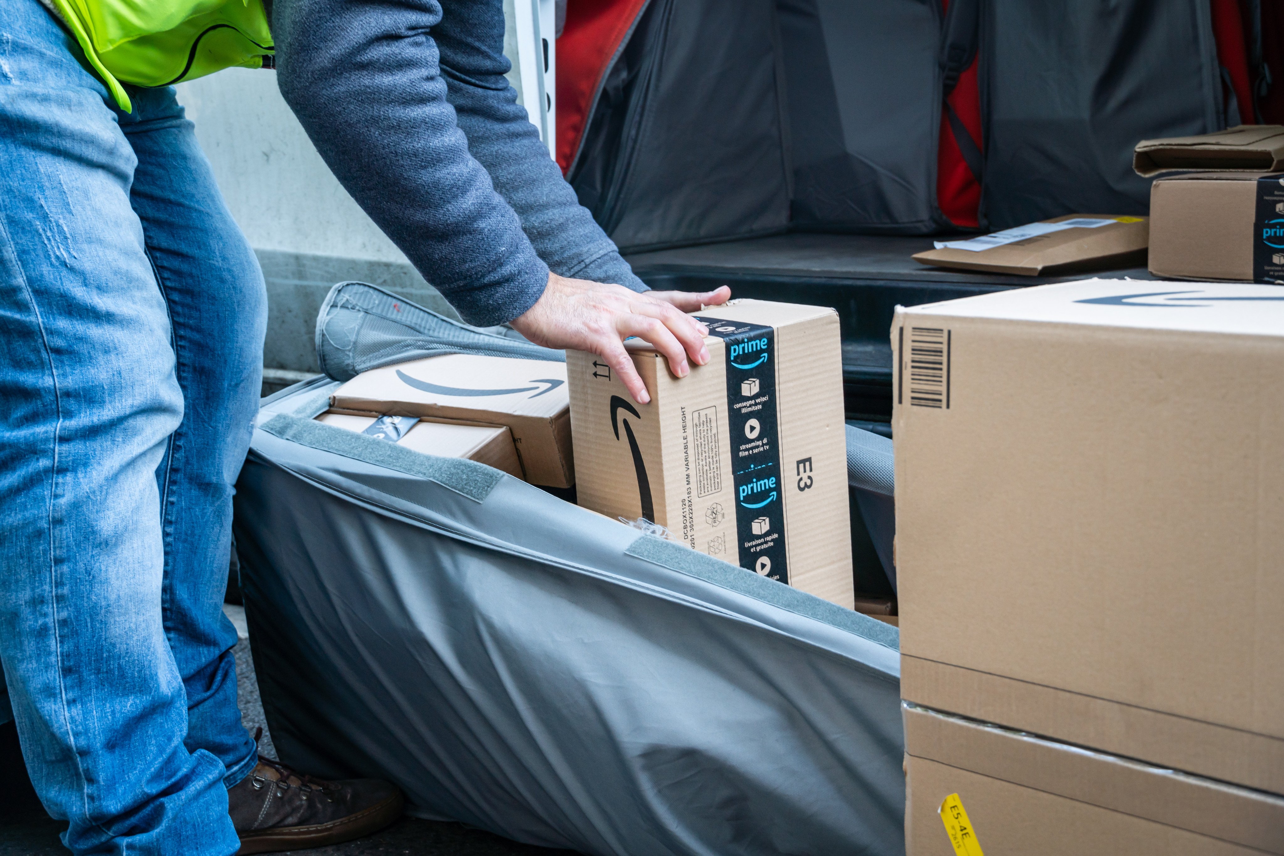 An Amazon delivery agent handles packages. Next week’s Amazon Prime Day is expected to feel the weight of Washington’s tariffs on trade partners. Photo: Shutterstock
