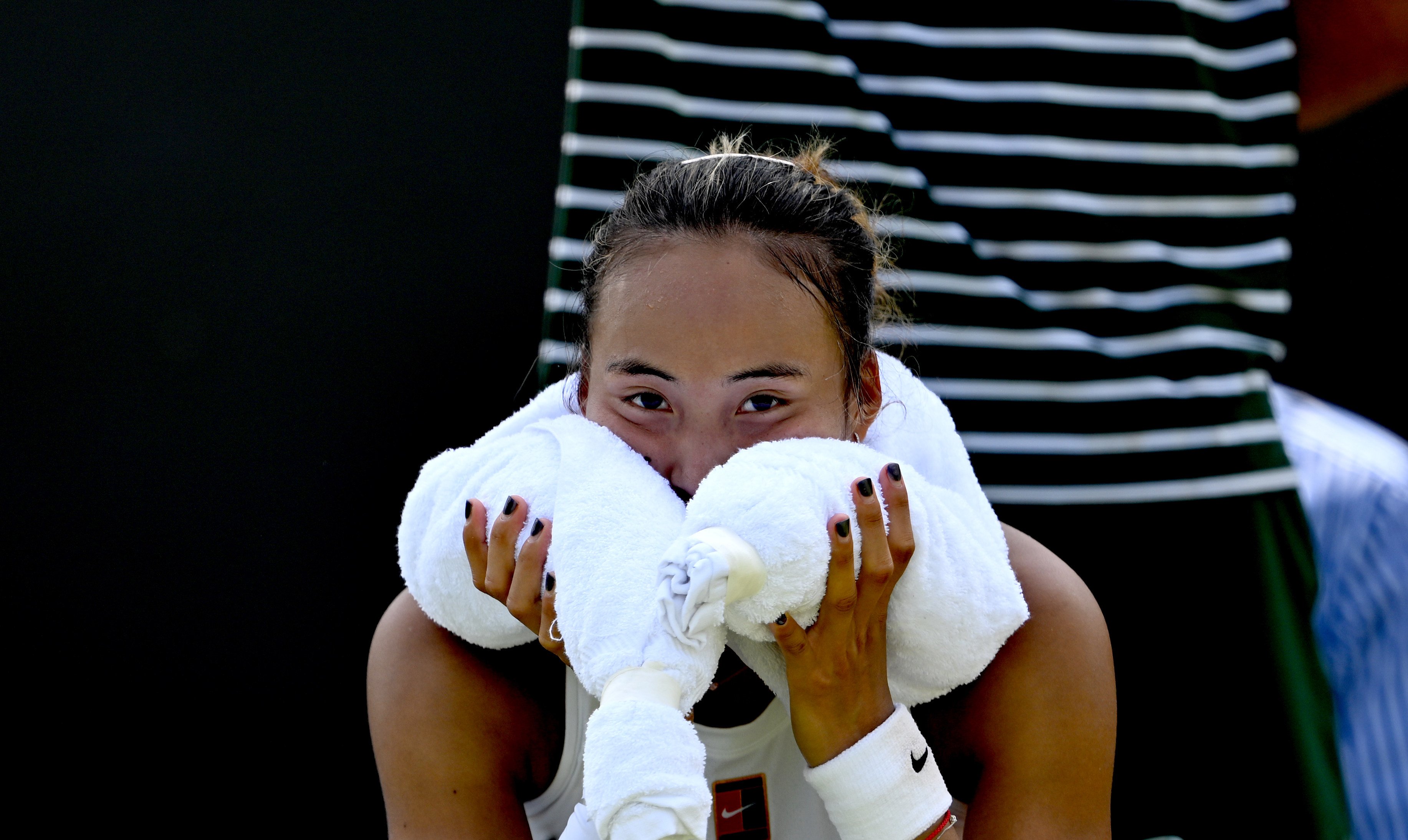 Zheng Qinwen shows her disappointment following her first-round defeat to Katerina Siniakova at Wimbledon. Photo: Xinhua