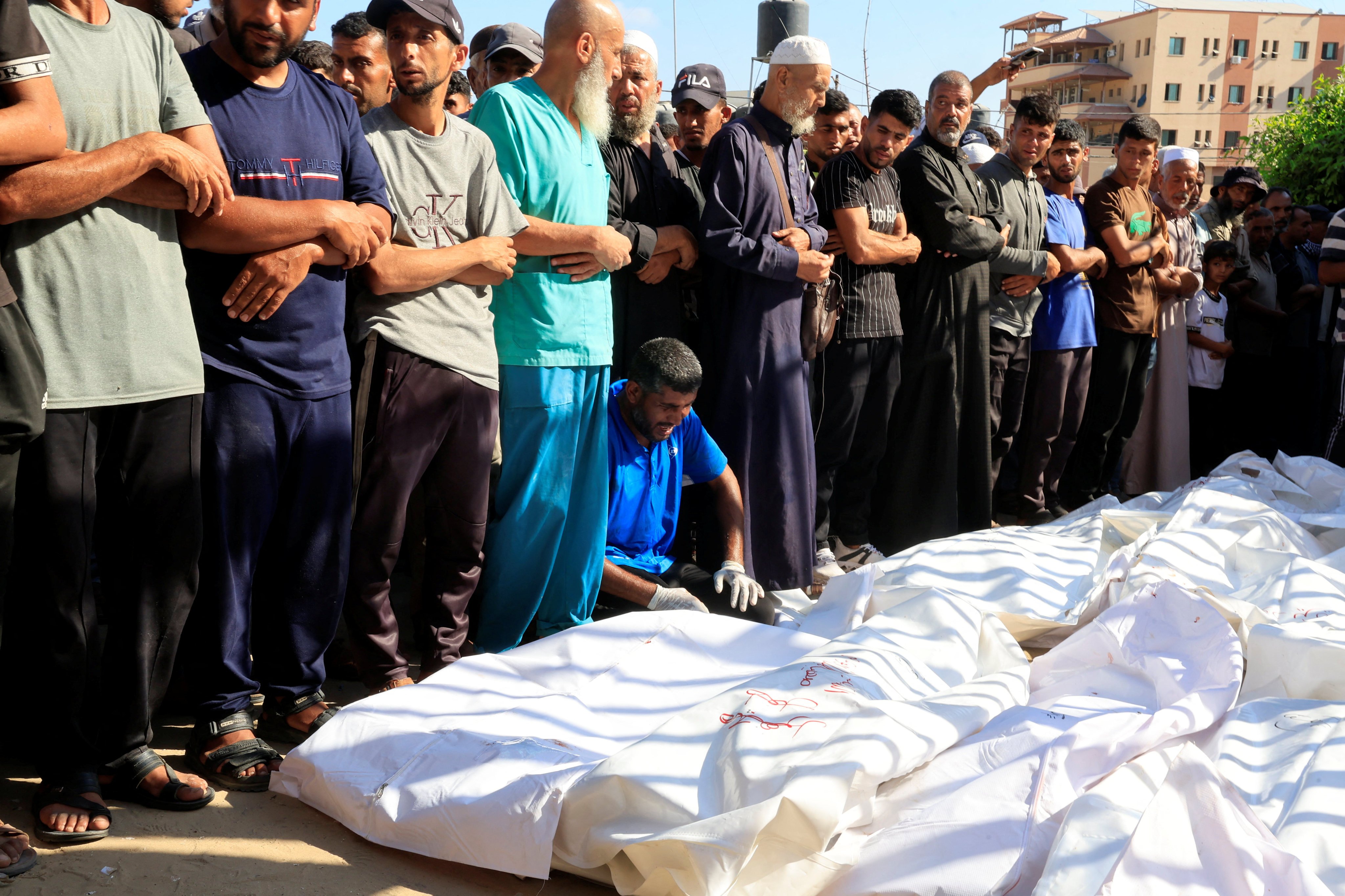 Mourners pray during the funeral of Palestinians, who, according to Gaza’s health ministry, were killed in an overnight Israeli strike. Photo: Reuters