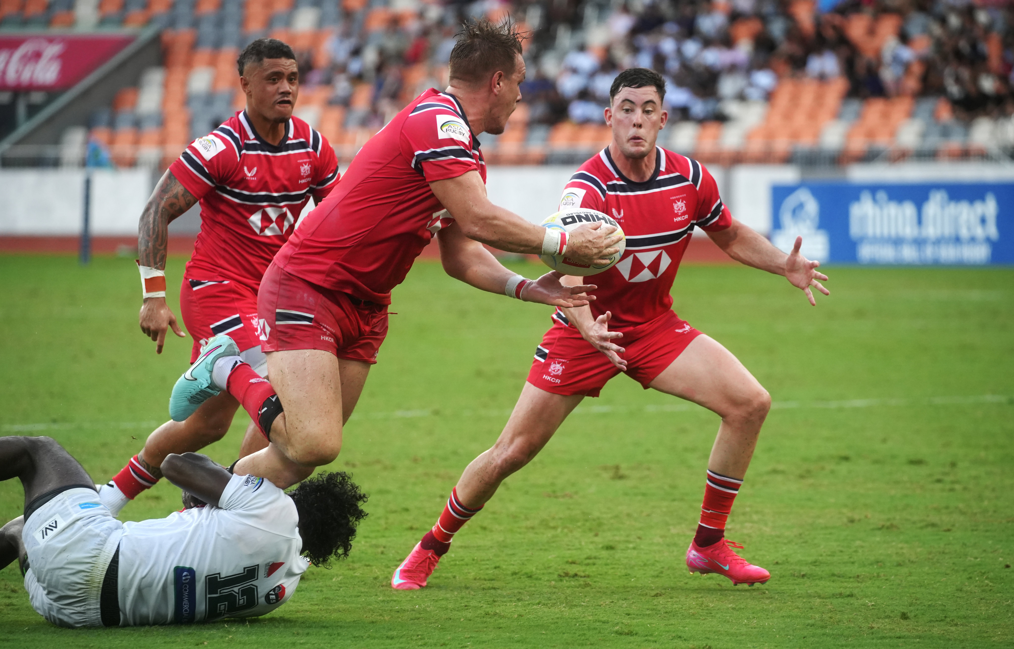Hong Kong’s Paul Altier receives a pass in the match against Sri Lanka at Kai Tak Youth Sports Ground last month. Photo: Sun Yeung