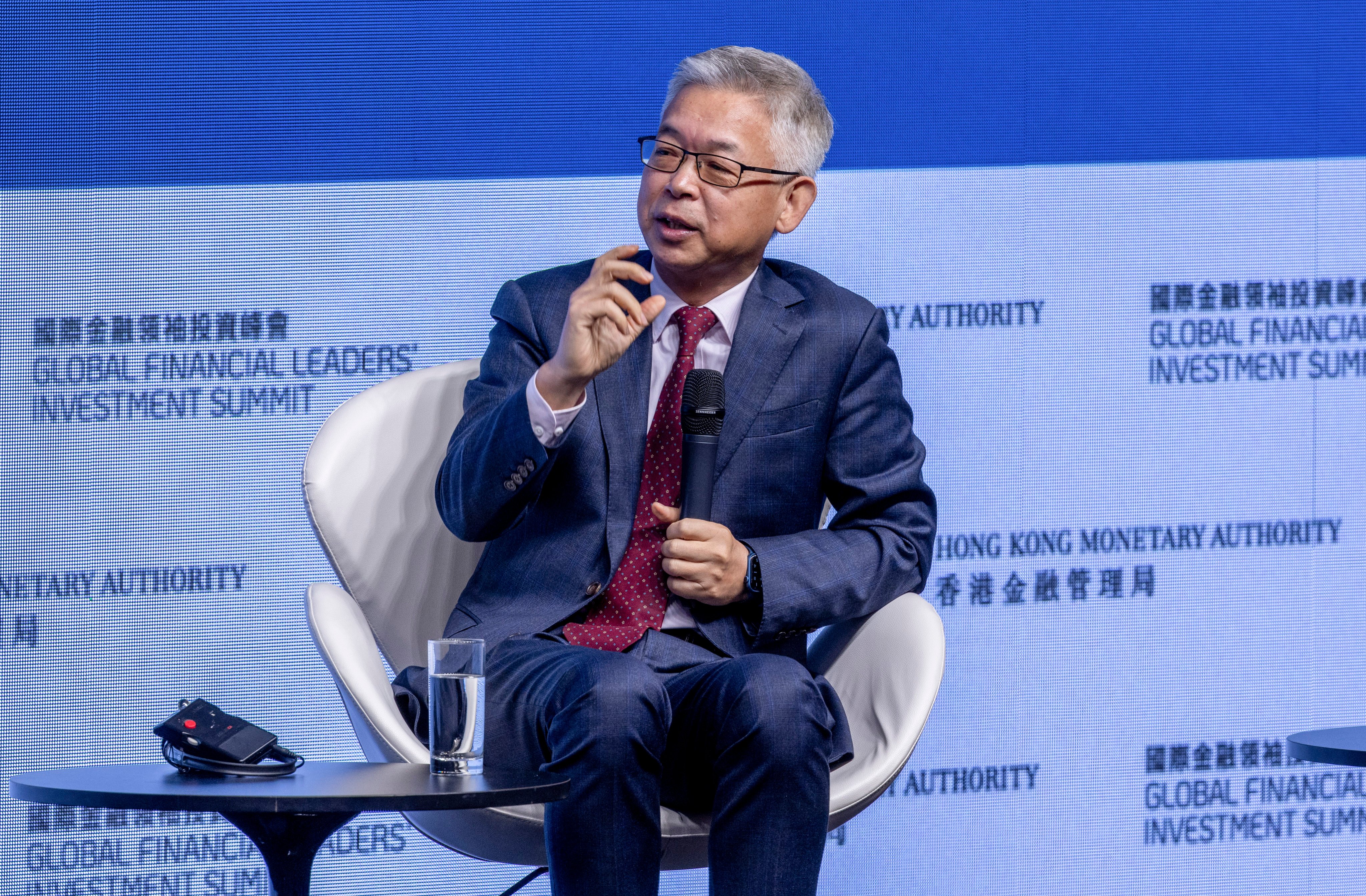 Huang Yiping, an economist and adviser to the People’s Bank of China, has suggested Hong Kong launch a stablecoin backed by the offshore yuan. Photo: Dickson Lee