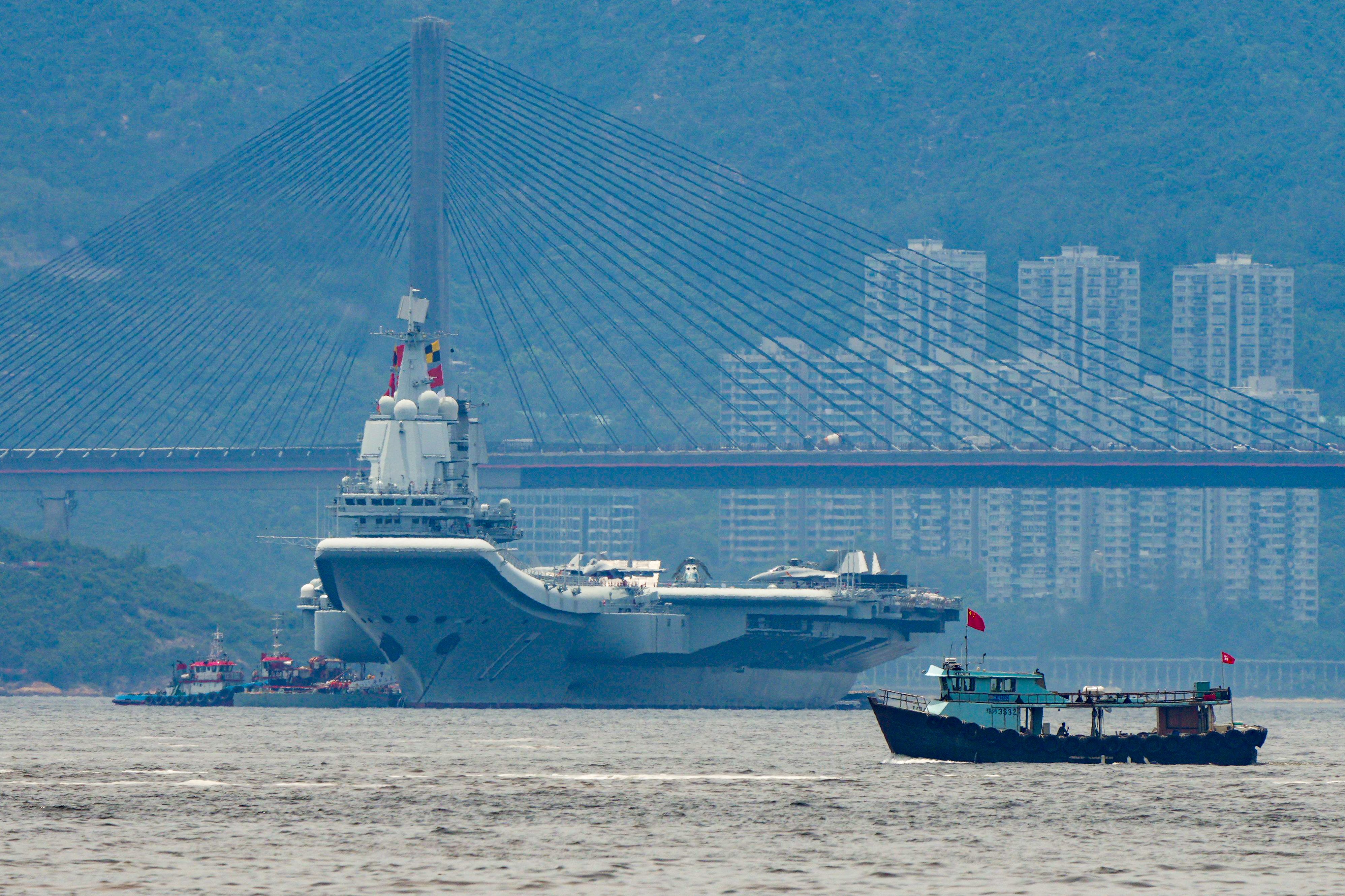 The Chinese aircraft carrier Shandong and its accompanying strike group arrive in Hong Kong  on Thursday morning. Photo: Eugene Lee