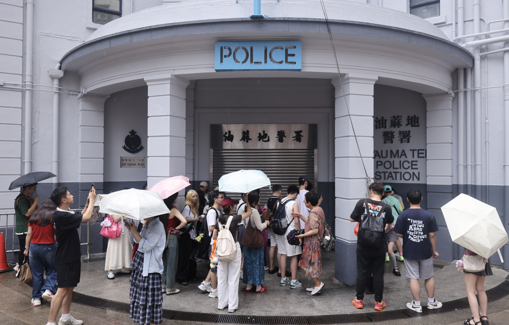 Tourists visit the old Yau Ma Tei Police Station in Yau Ma Tei. Photo: Nora Tam Tourists visit the old Yau Ma Tei Police Station in Yau Ma Tei. Photo: Nora Tam