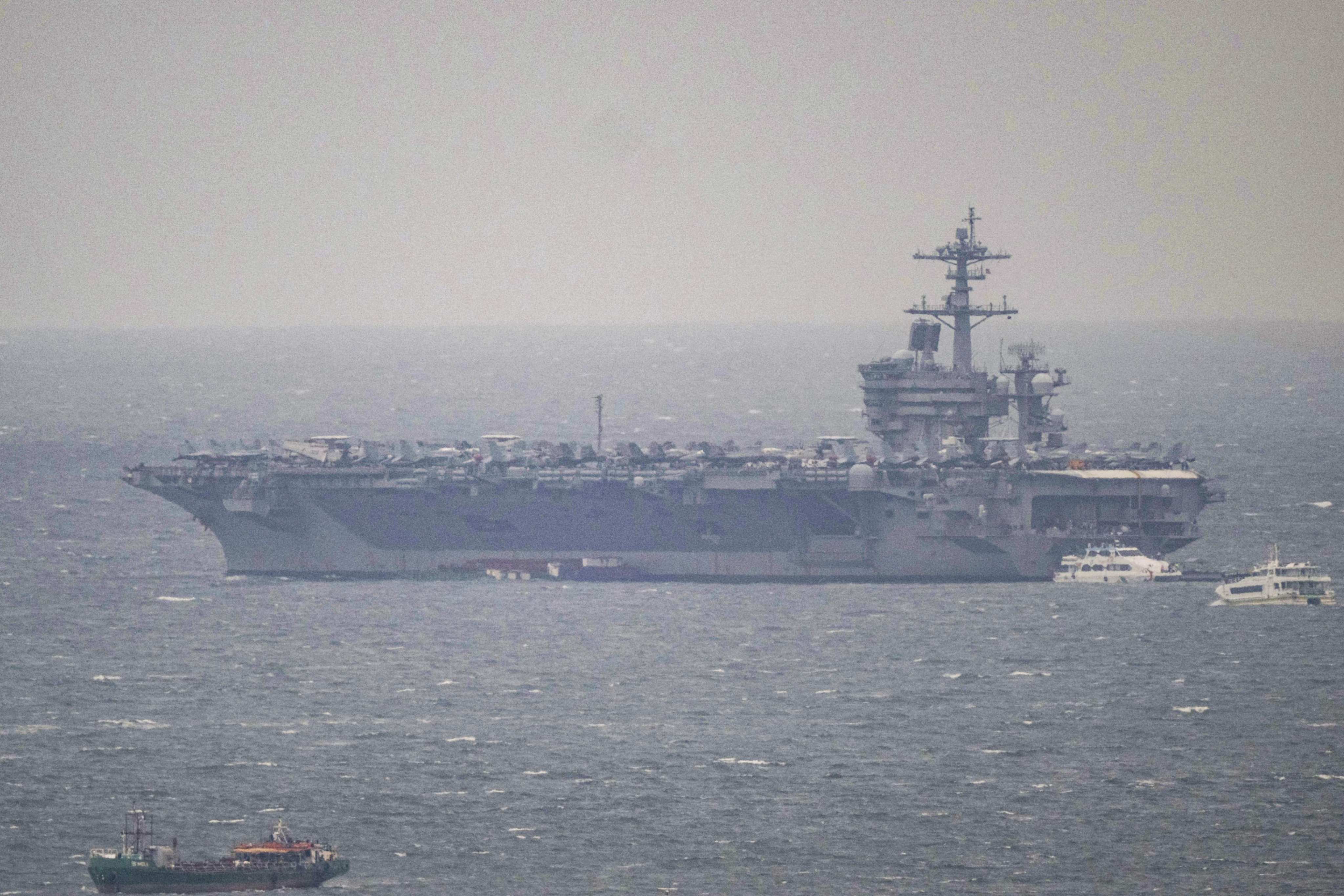 The USS George Washington is seen berthing at Manila Bay on Thursday. Photo: AFP