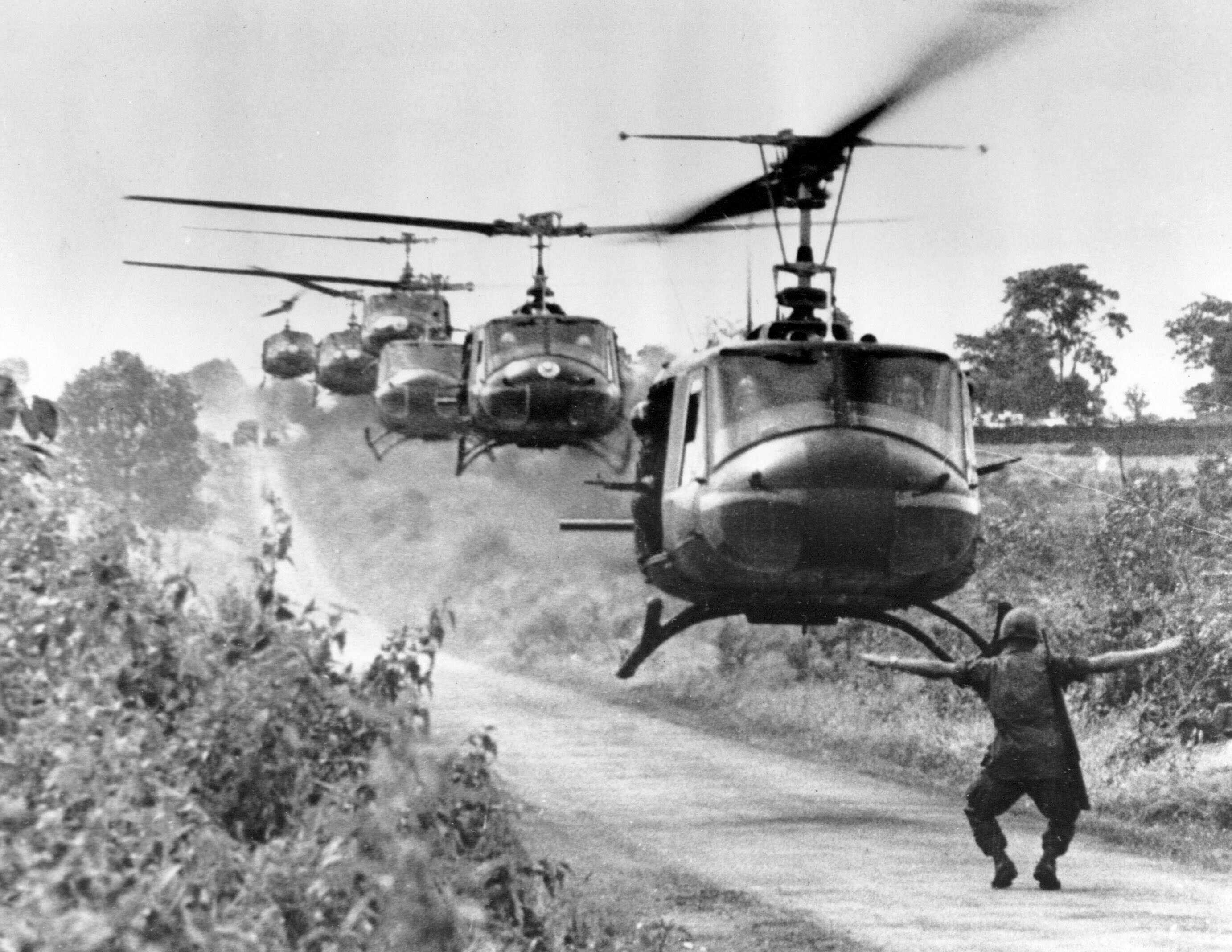 Huey helicopters carrying US troops land in Vietnam in August 1965. Photo: AP