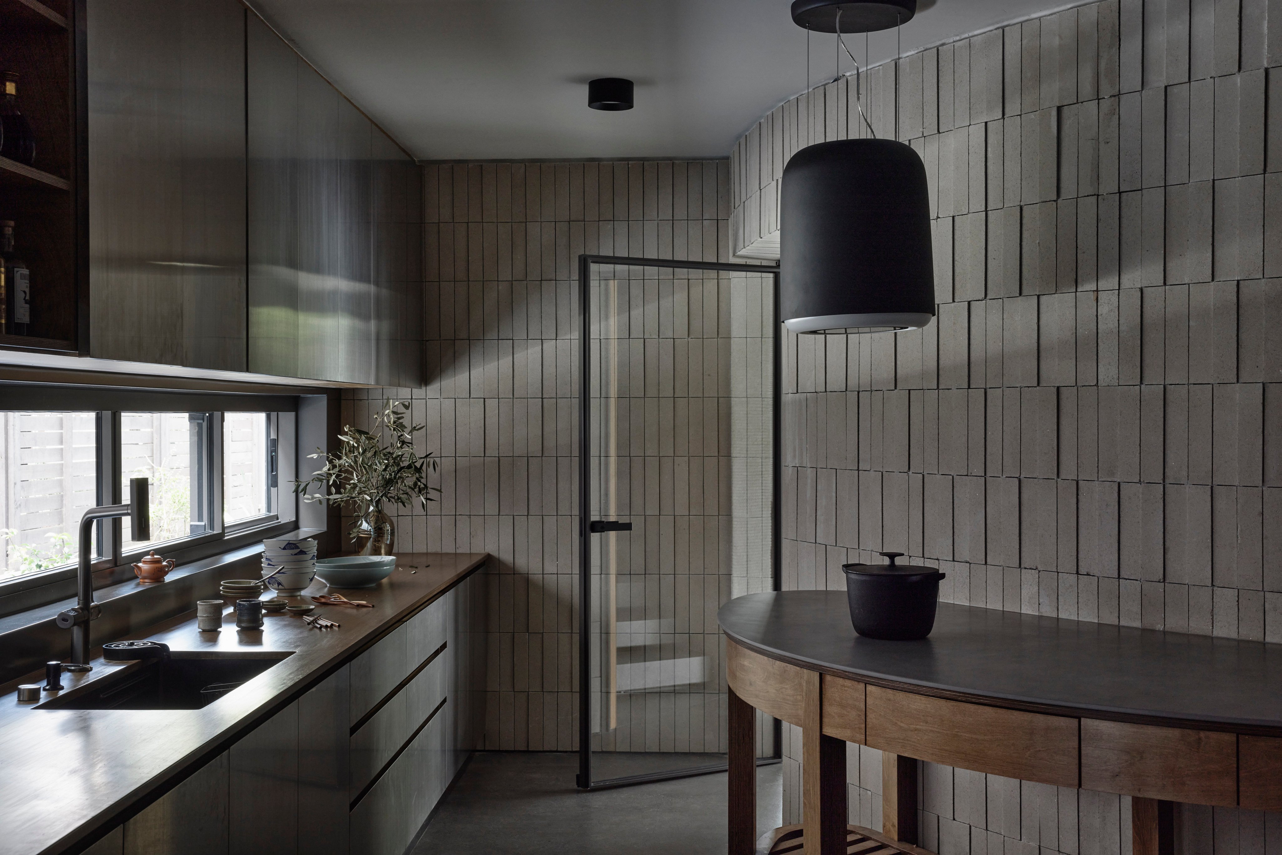 The kitchen on the ground floor of QR3D, Singapore’s first 3D-printed house, designed by architect/owner Lim Koon Park, founder and Principal of Park + Associates. Photo: Derek Swalwell